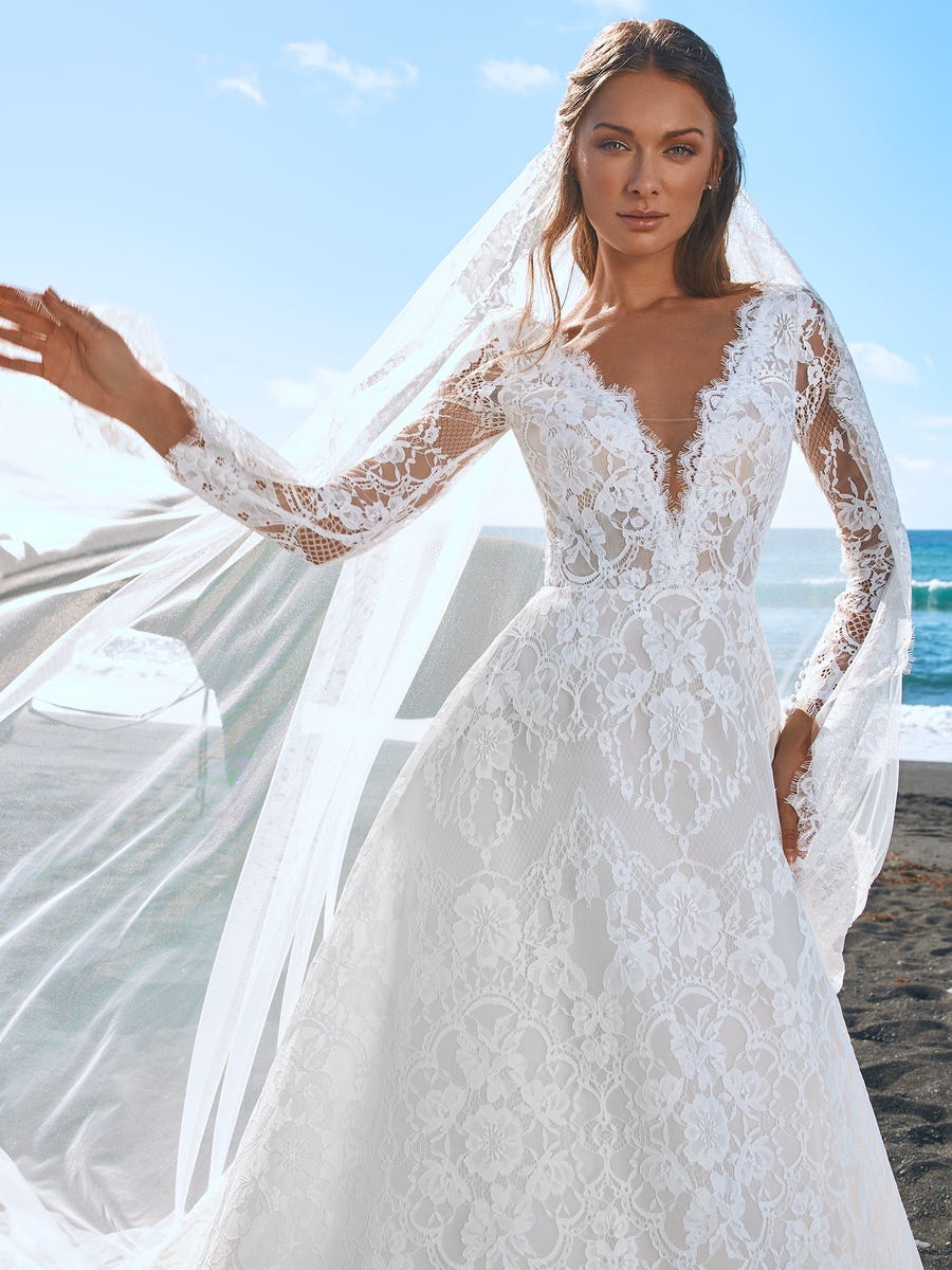 Abito in pizzo sposa sale