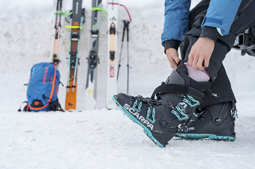 Alpine touring boots in downhill outlet bindings