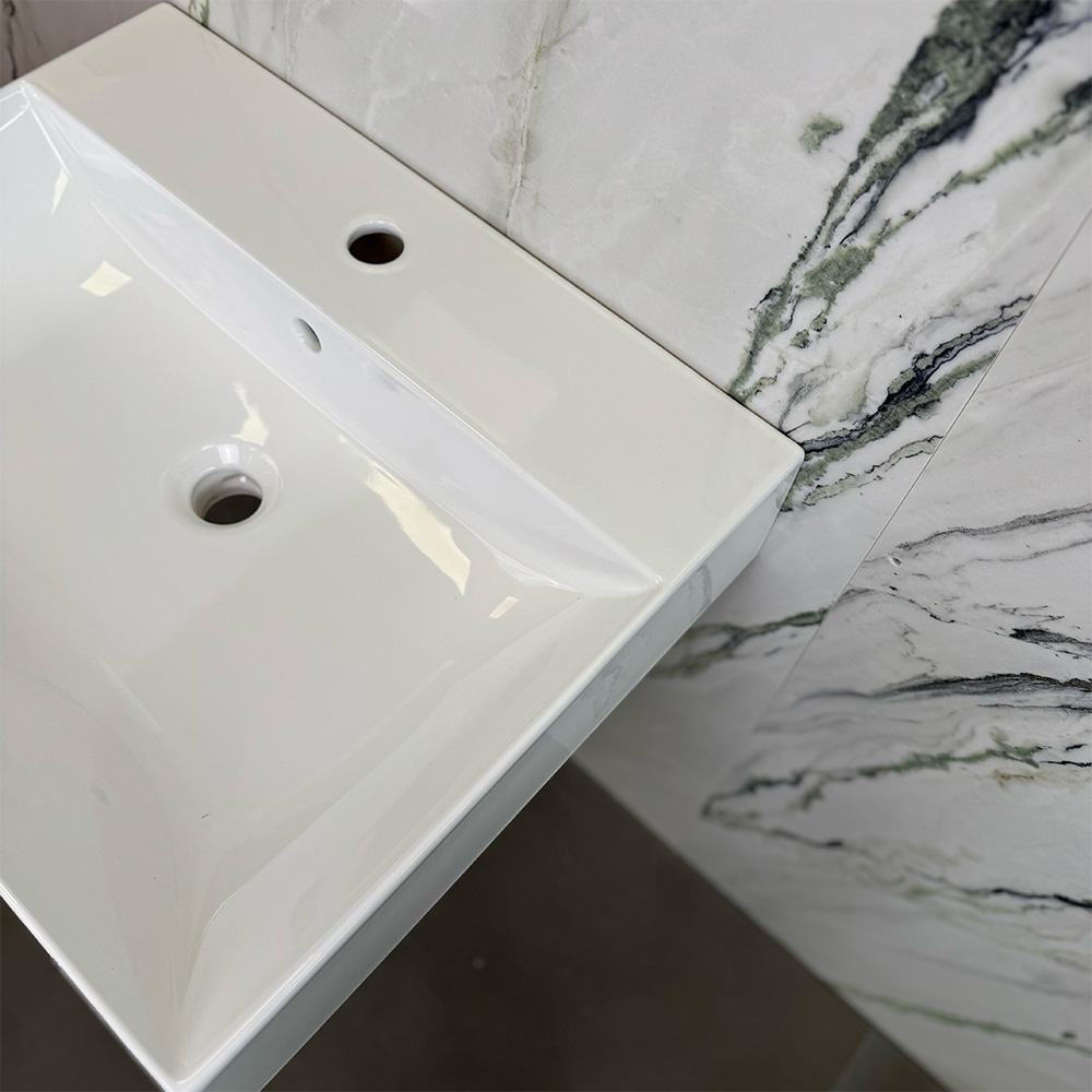 Hatria BAHIA_13 Wall-mounted washbasin with hole 60x46.5cm in glossy white ceramic