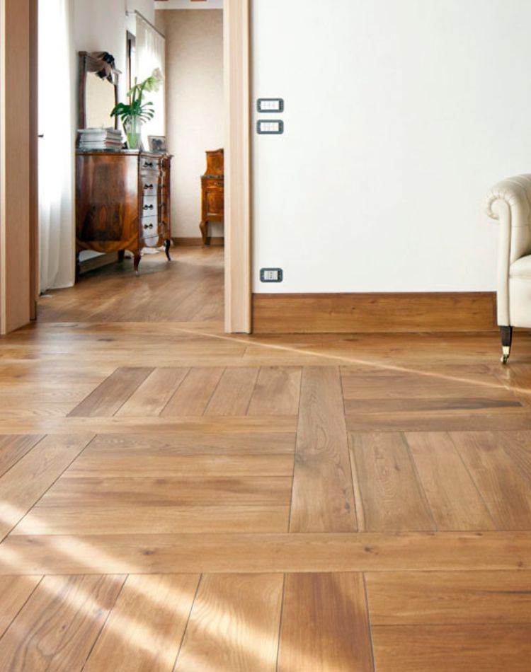 pavimento in legno olmo recuperato con posa a disegno
