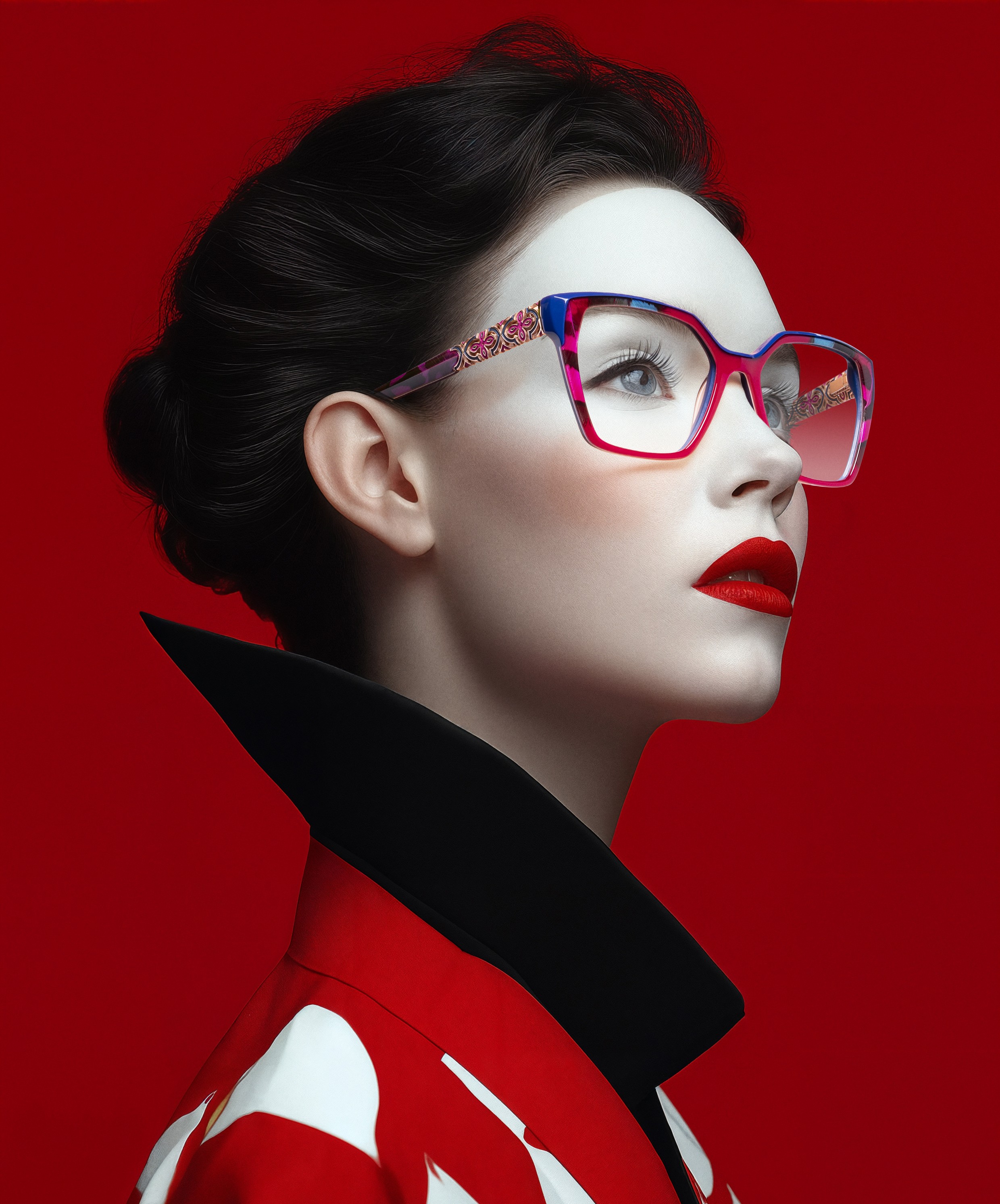  A sophisticated lady donning a blue dress and elegant glasses Cocosong, exuding an air of refinement and grace.
