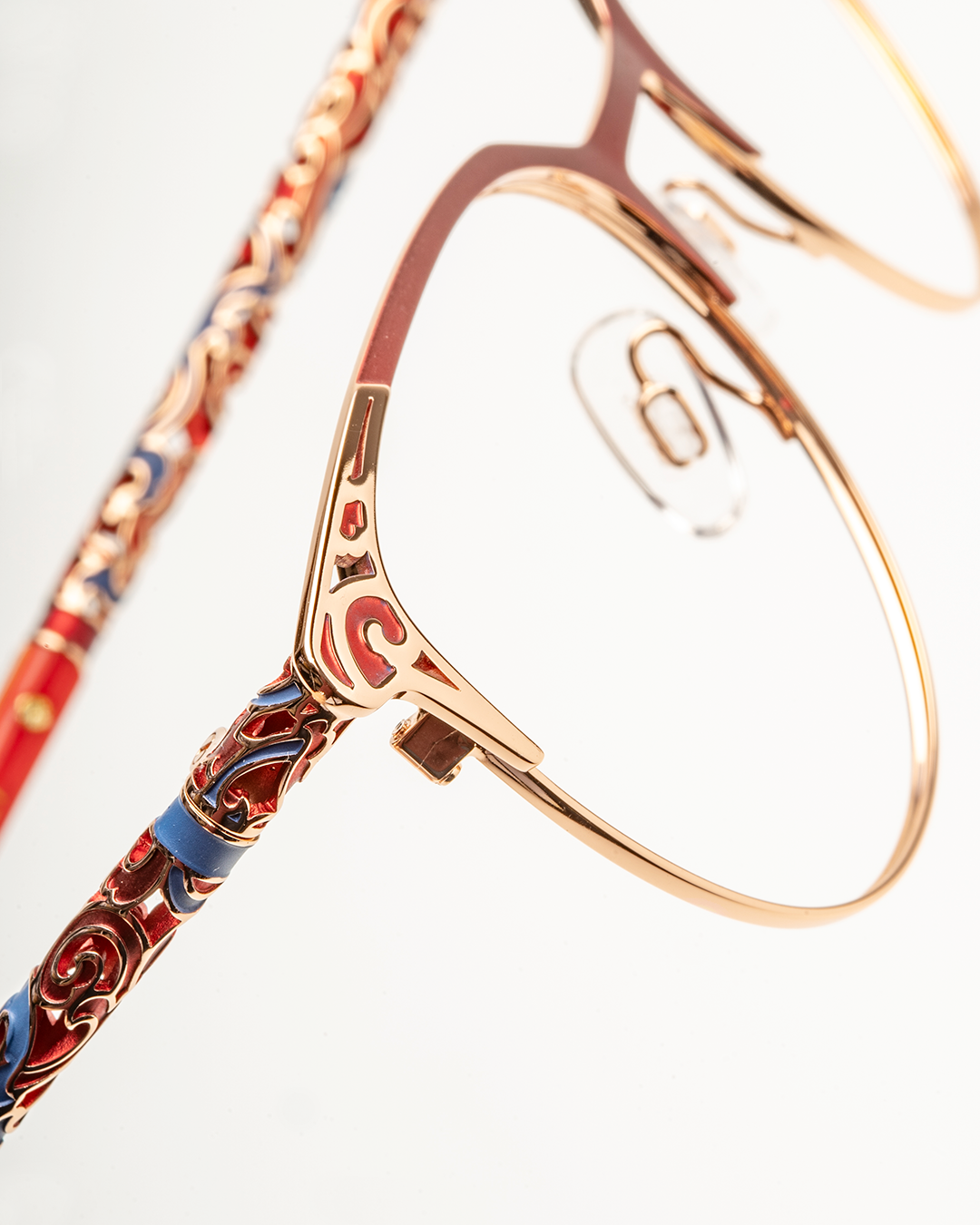 A pair of glasses with a vibrant and artistic design, adding a pop of color to any outfit.