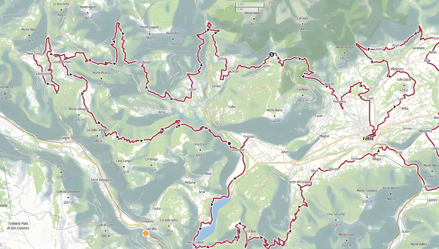Mappa Cammino Retico, Mappa topografica con percorsi escursionistici segnati in rosso intorno alla città di Feltre e alle montagne circostanti.