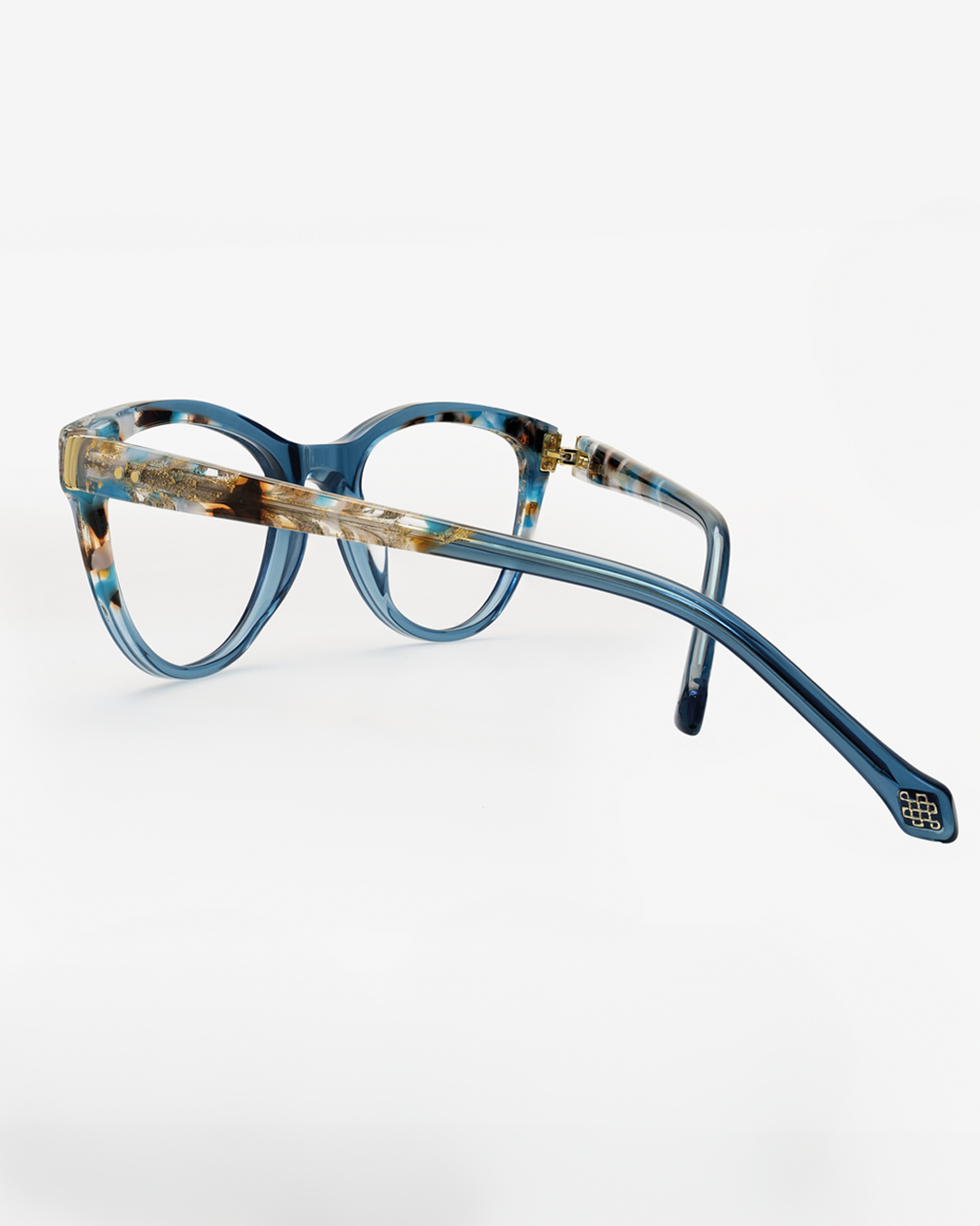 A splendid pair of glasses ccs adorned with exquisite floral patterns, adding a touch of elegance and sophistication to any ensemble.