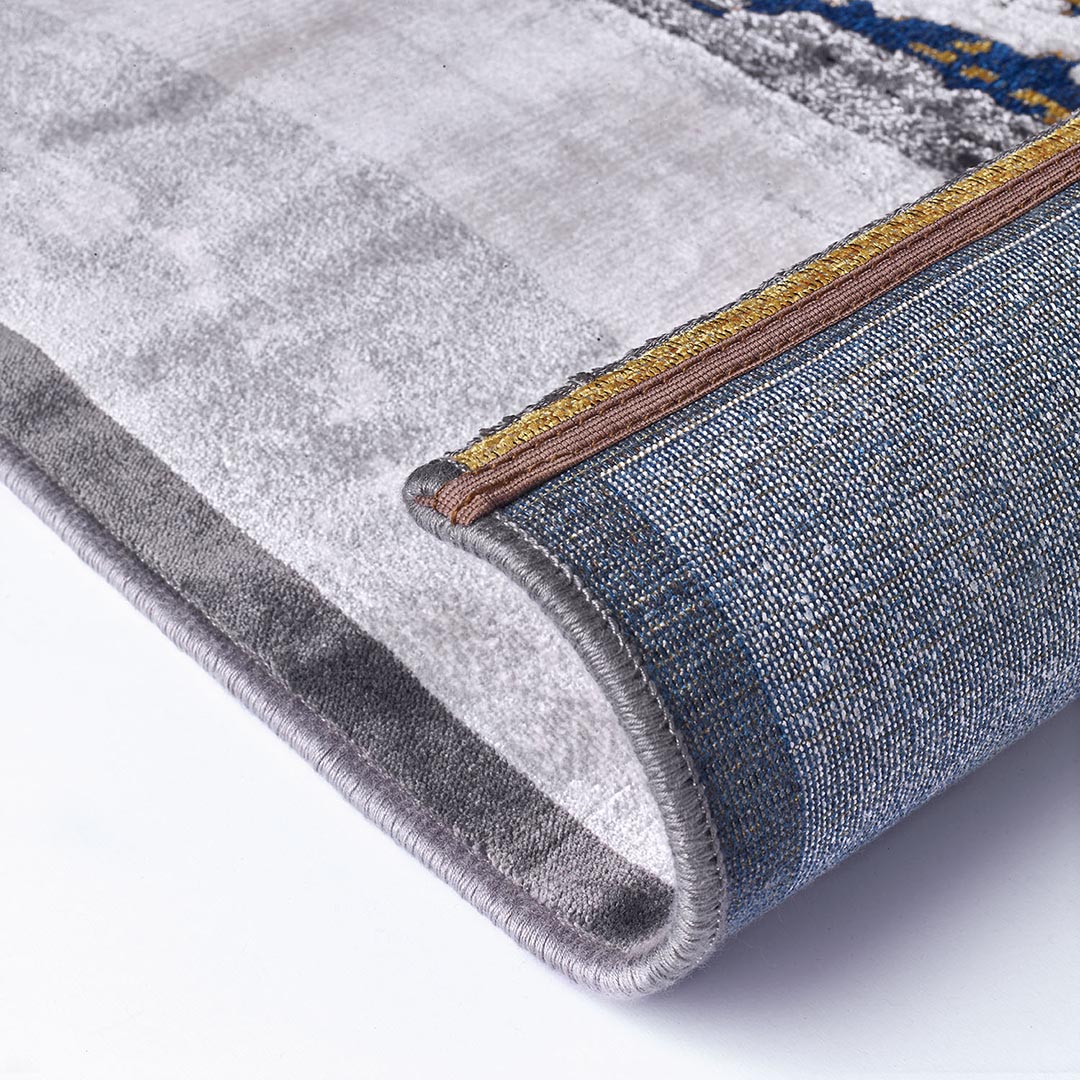 Tappeto GABRIELLE 401X/Q13: Colori e Dinamismo per il Tuo Soggiorno