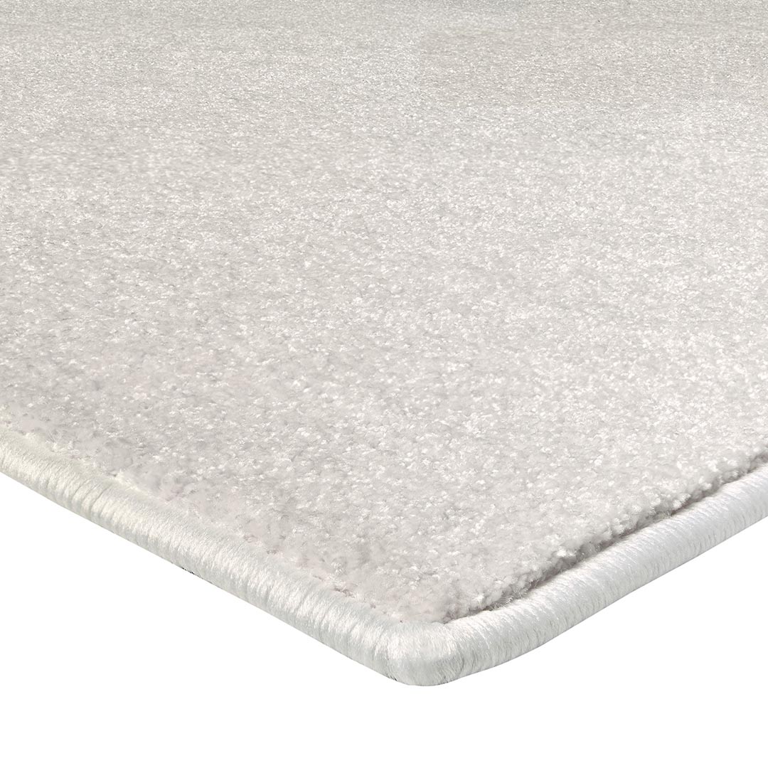 Tappeto LUMINOSA BIANCO: Eleganza Monocromatica per il Tuo Salotto