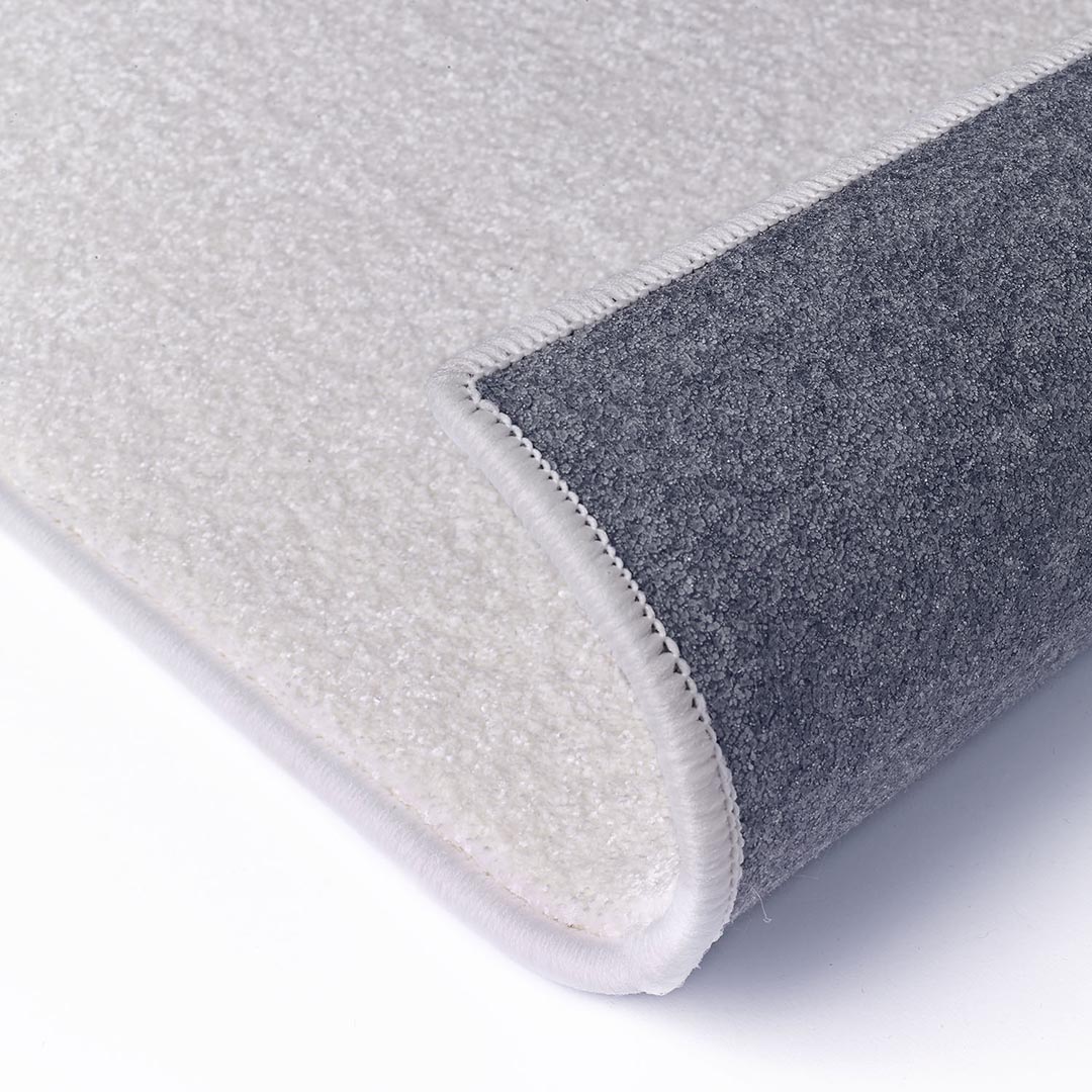Tappeto LUMINOSA BIANCO: Eleganza Monocromatica per il Tuo Salotto