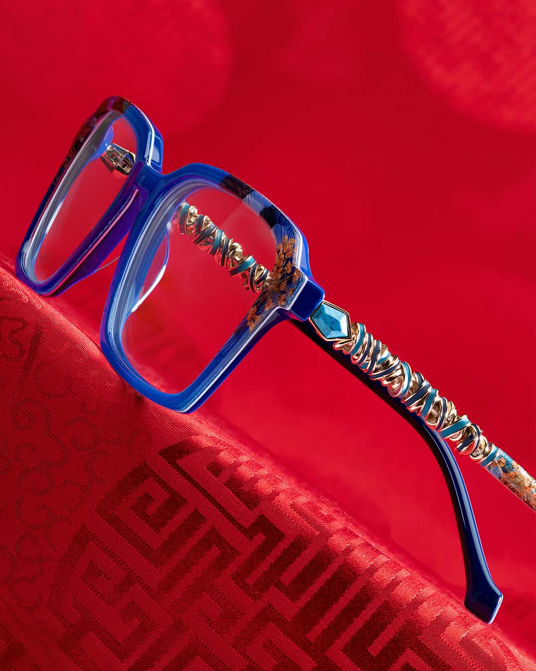 Stylish glasses with red and yellow pattern, perfect for adding a pop of color to your look.