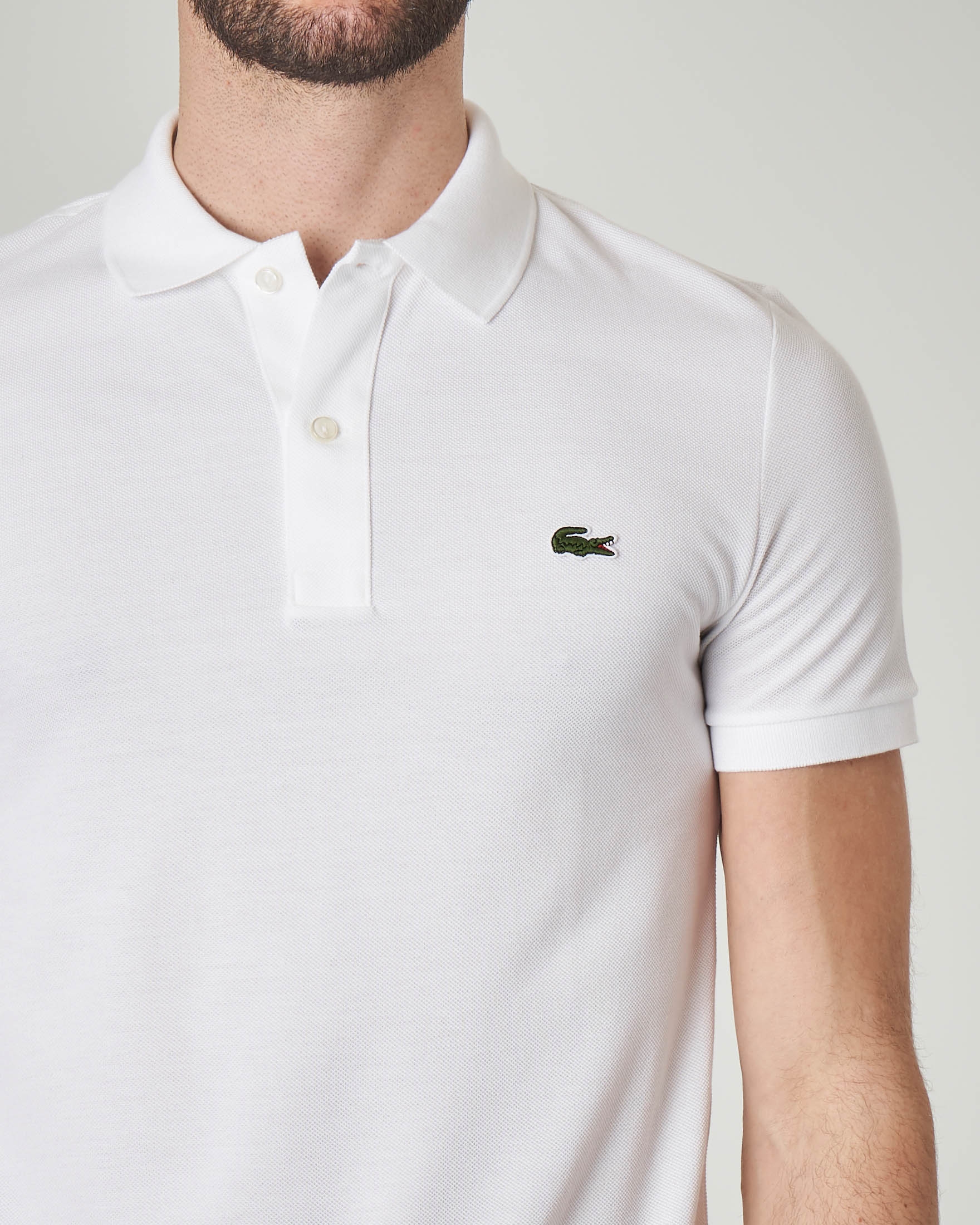 Polo shop lacoste bianca