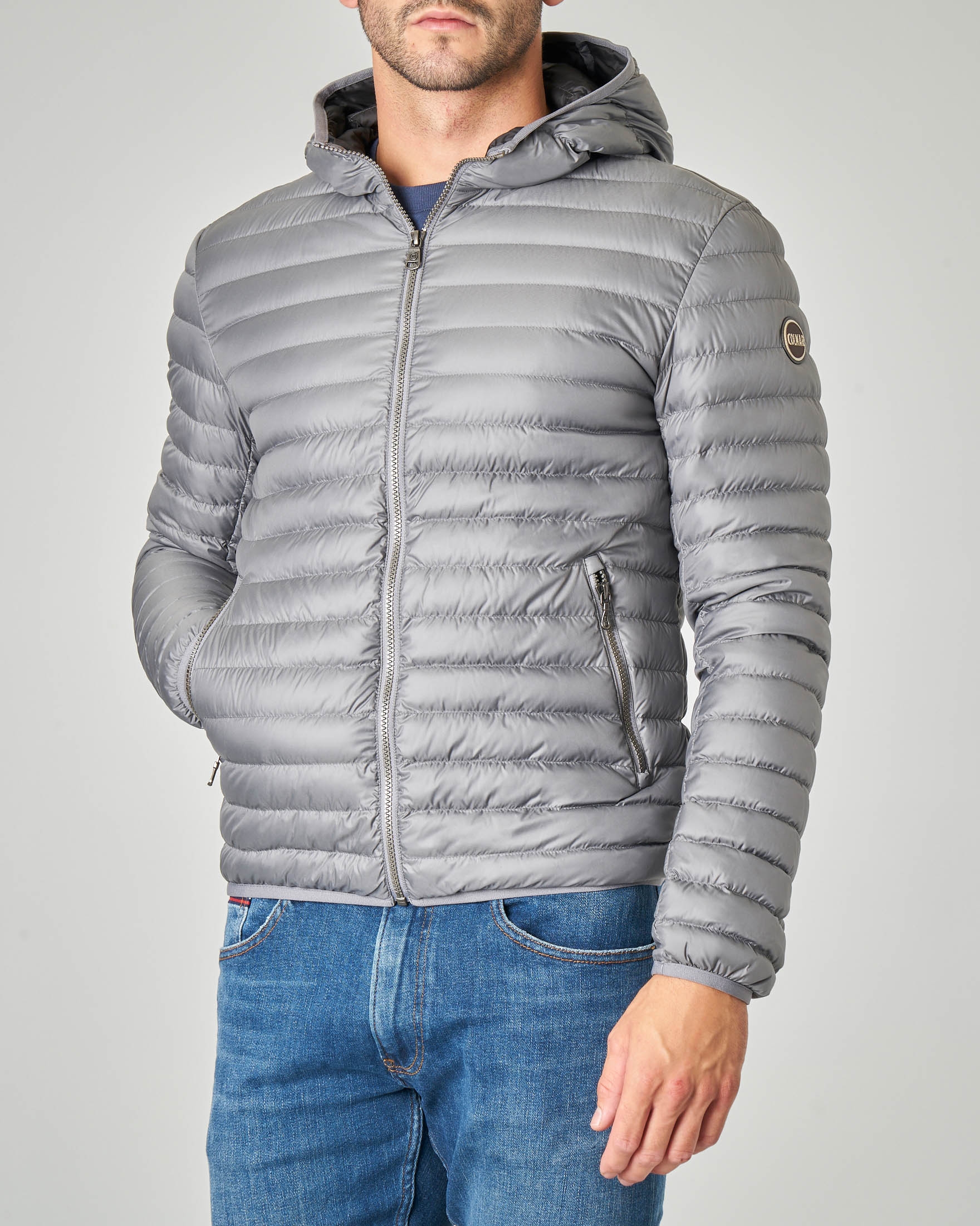 Piumino grigio leggero con cappuccio fisso