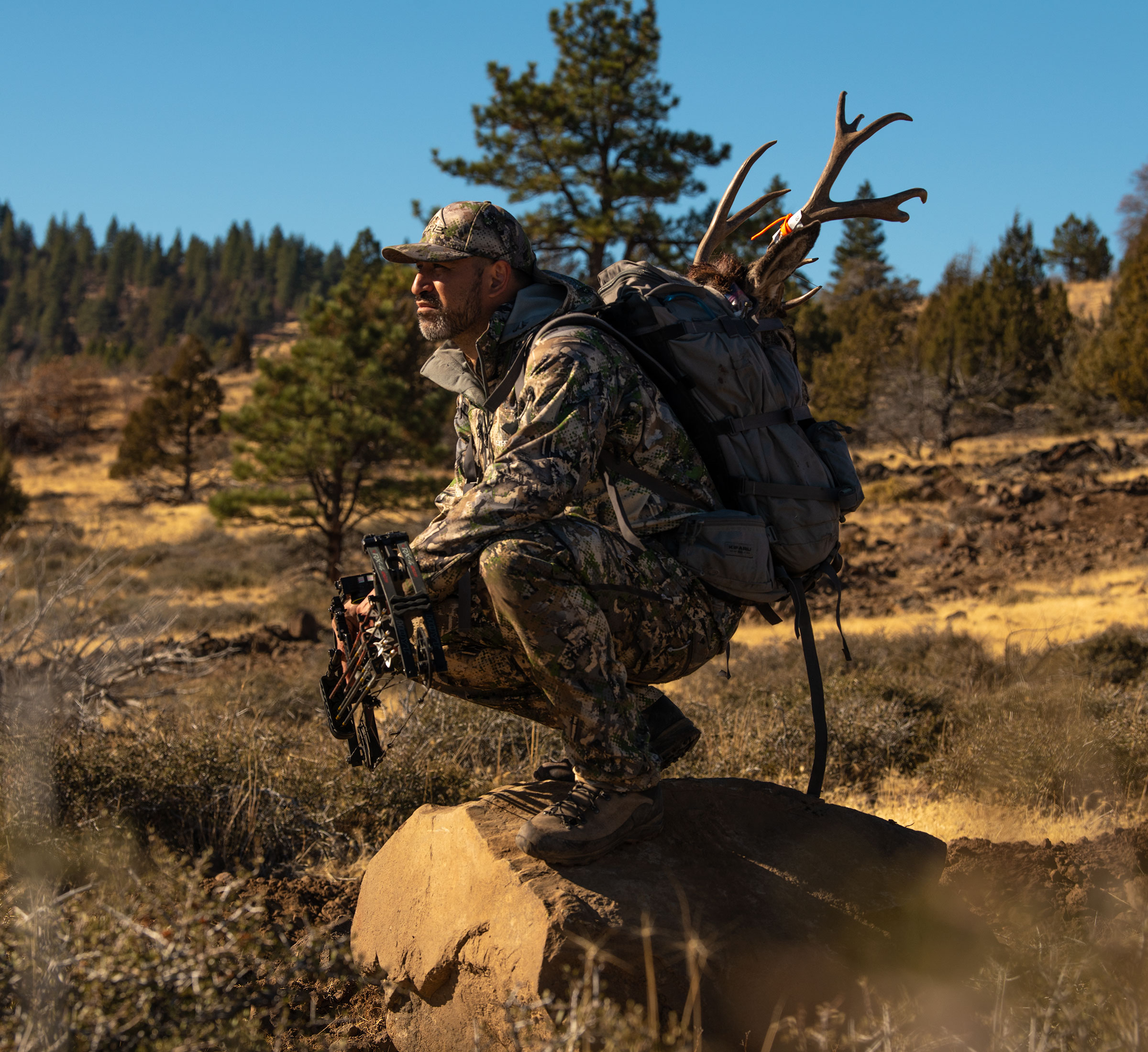 Zamberlan Hunting Ambassador kneeling while wearing Zamberlan boots.