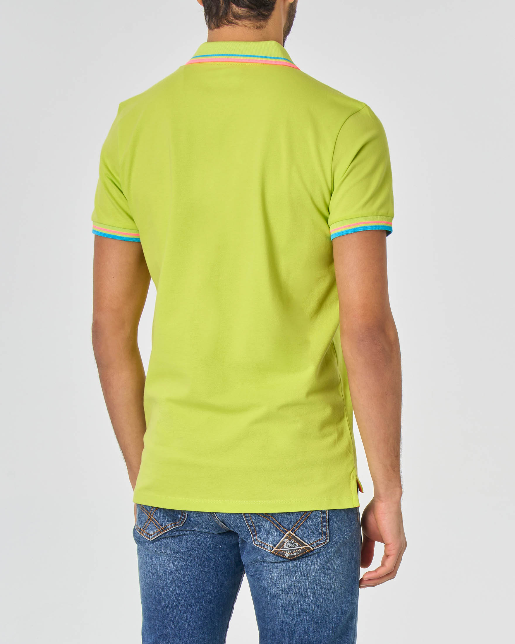 Polo color lime con bordino su collo e maniche fluo in contrasto