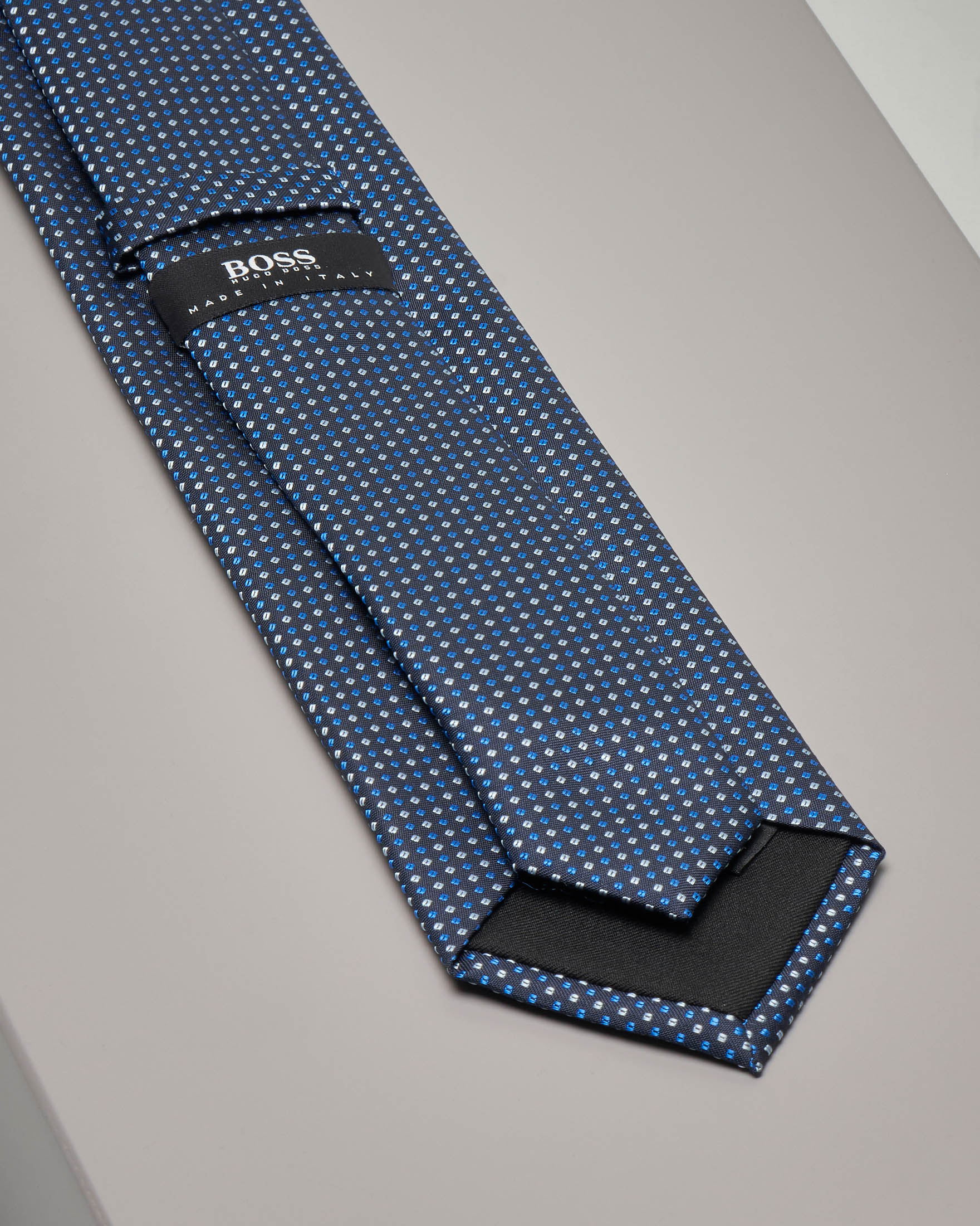 Cravatta blu in seta fantasia puntino bicolore