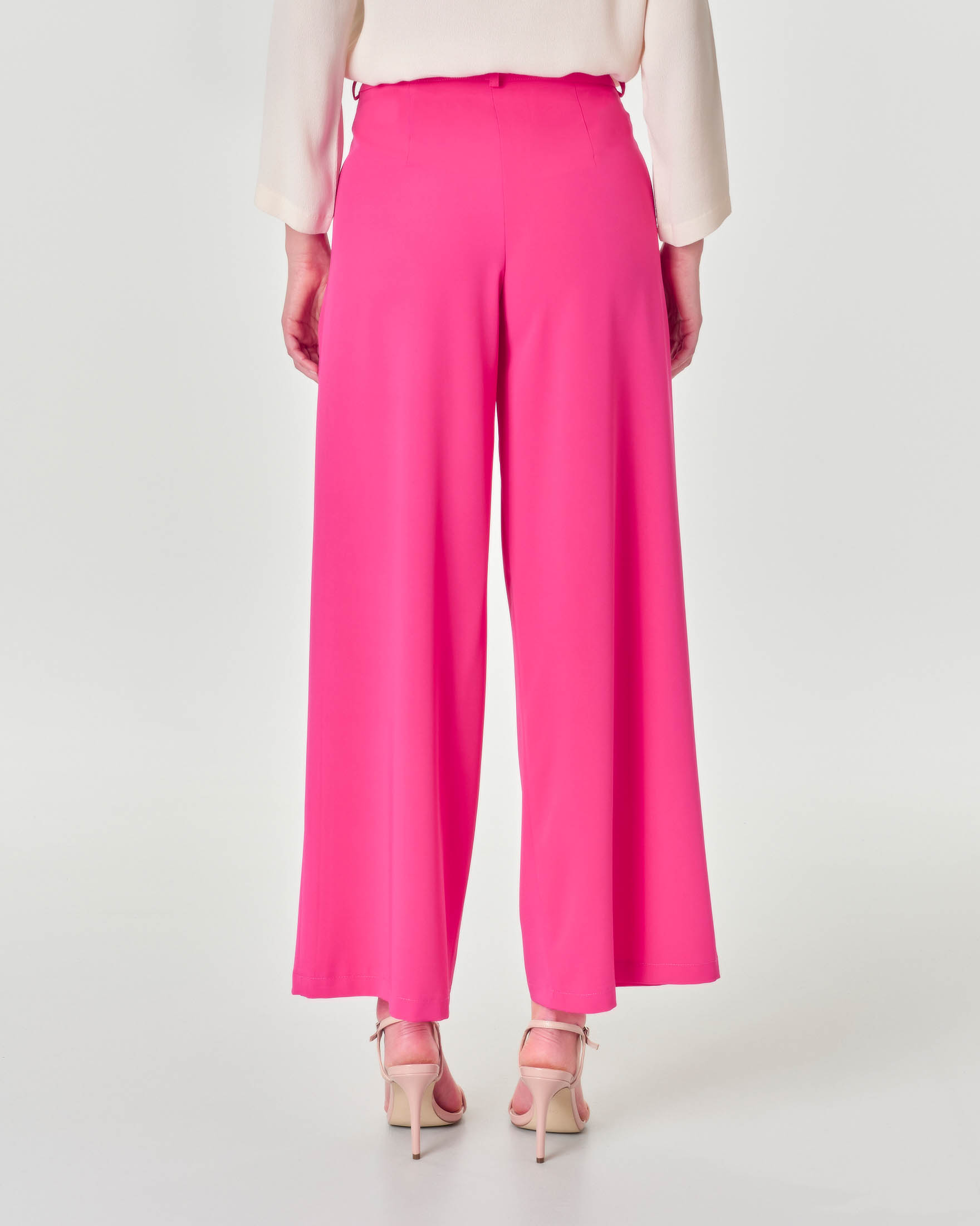 Pantaloni palazzo fucsia in tessuto stretch fluido con pinces in vita