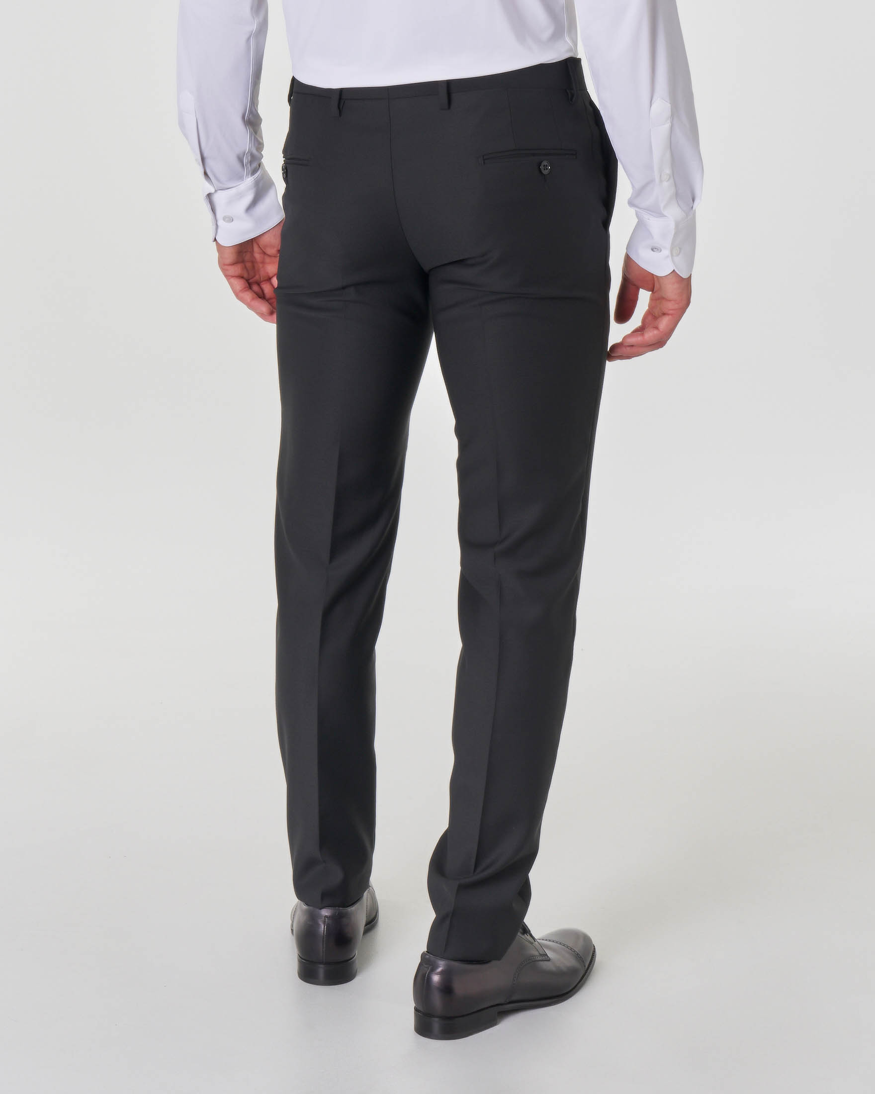 Abito smoking nero in tela di lana stretch