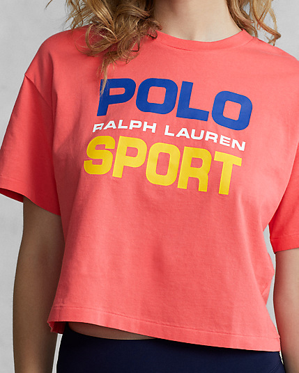 T-shirt color corallo dal taglio crop in cotone con maxi logo frontale blu e giallo