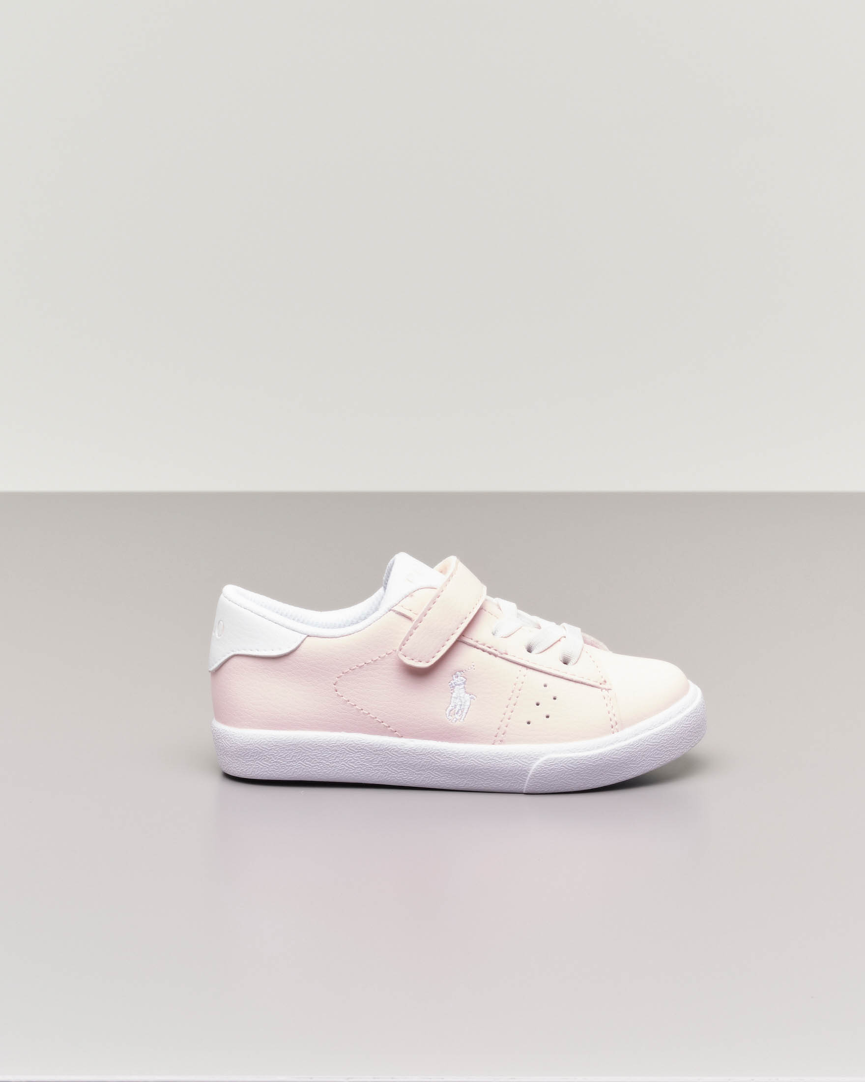 Sneakers rosa in ecopelle con pony bianco 20-26