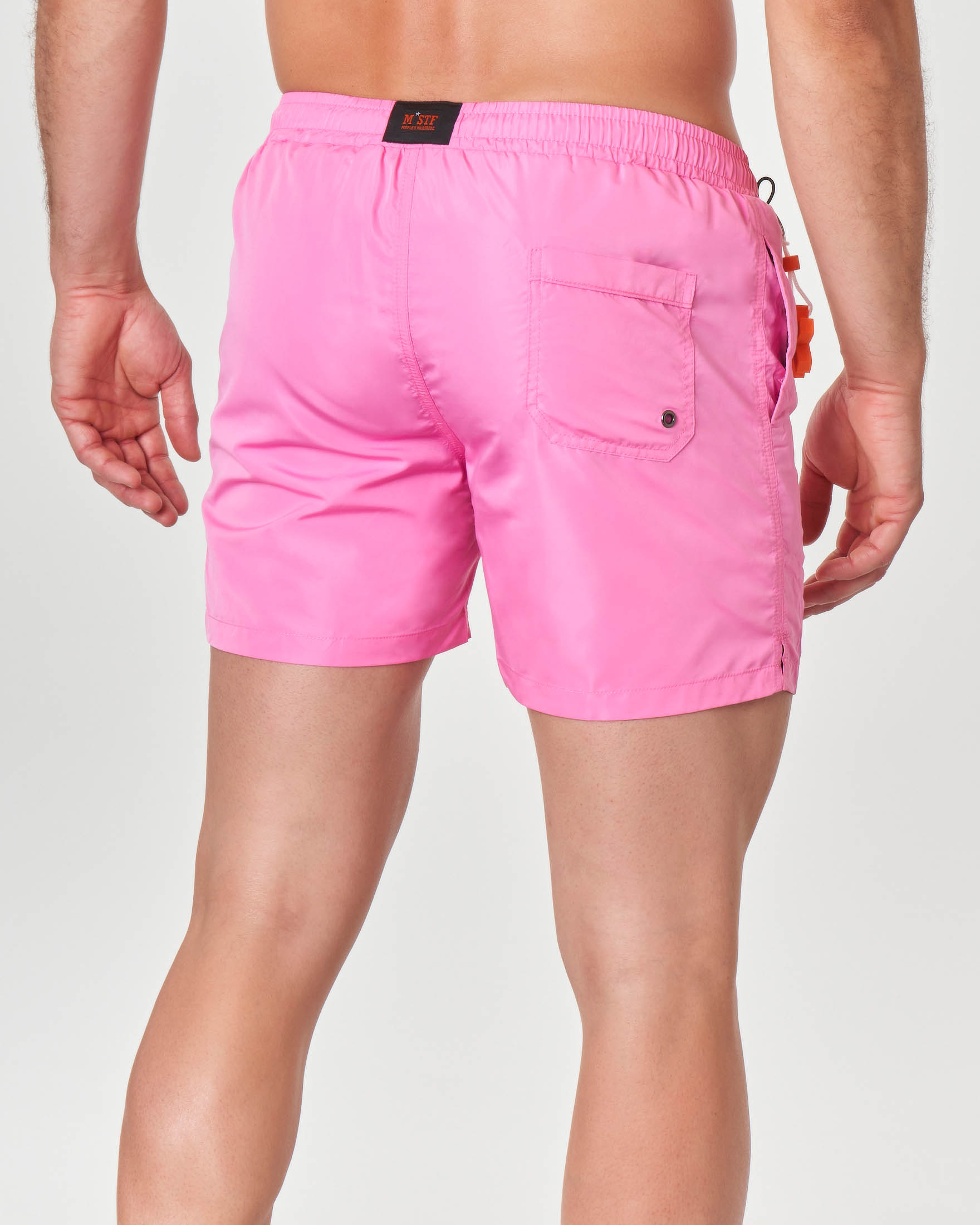 Boxer mare fucsia tinta unita con taschino sul retro