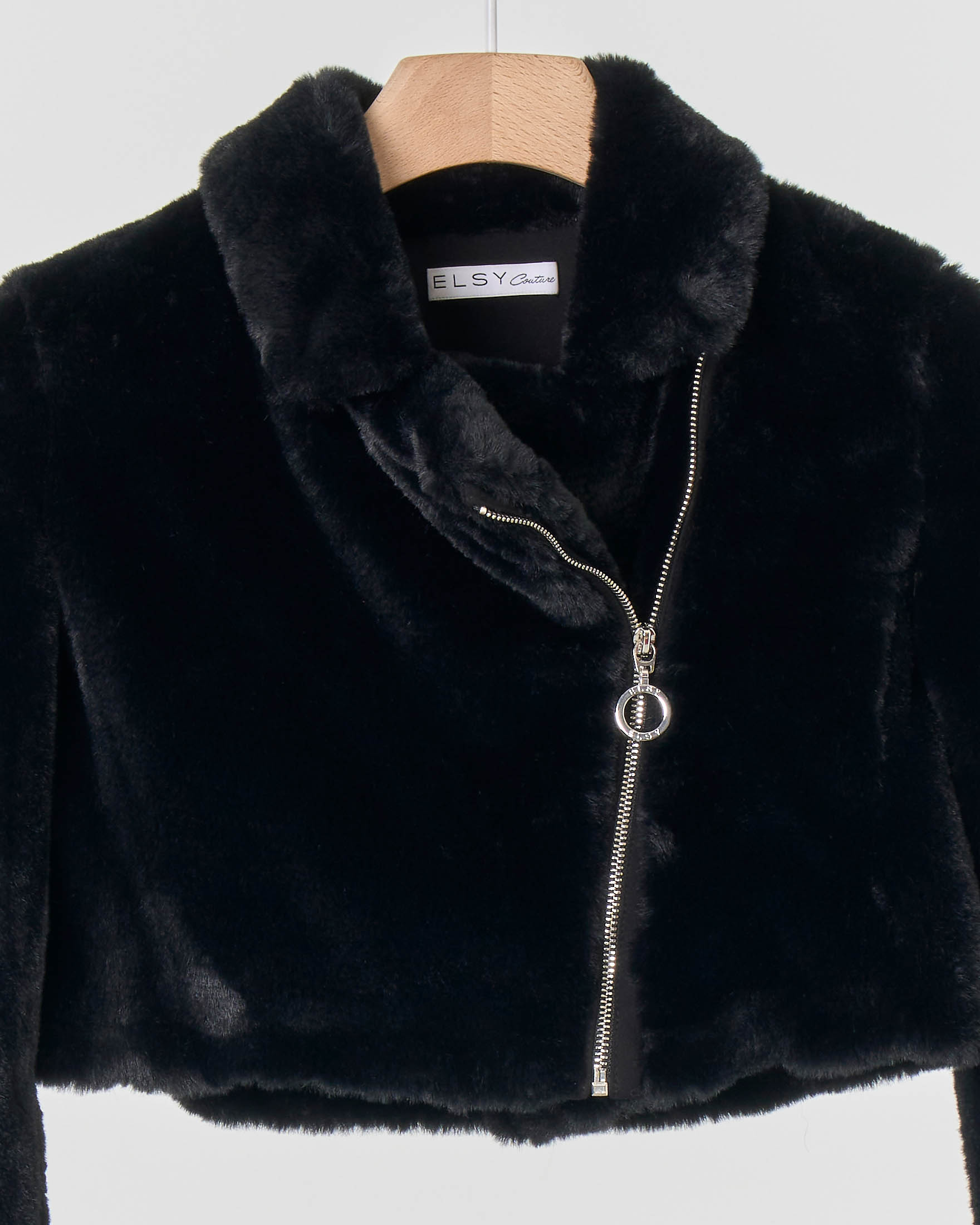 Bolero nero in eco-pelliccia con chiusura zip 32