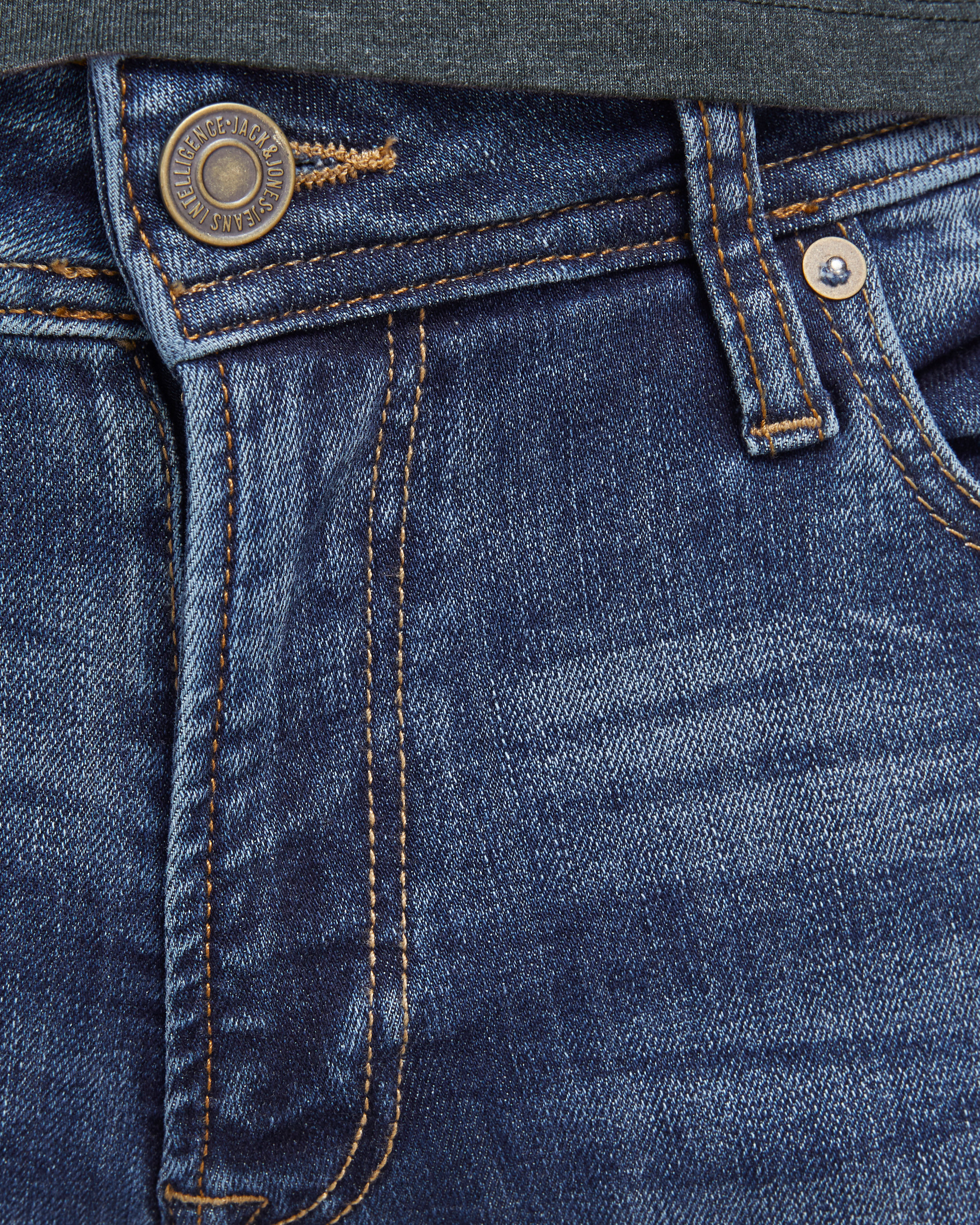 Jeans Liam skinny fit a vita bassa lavaggio scuro stone washed con baffature