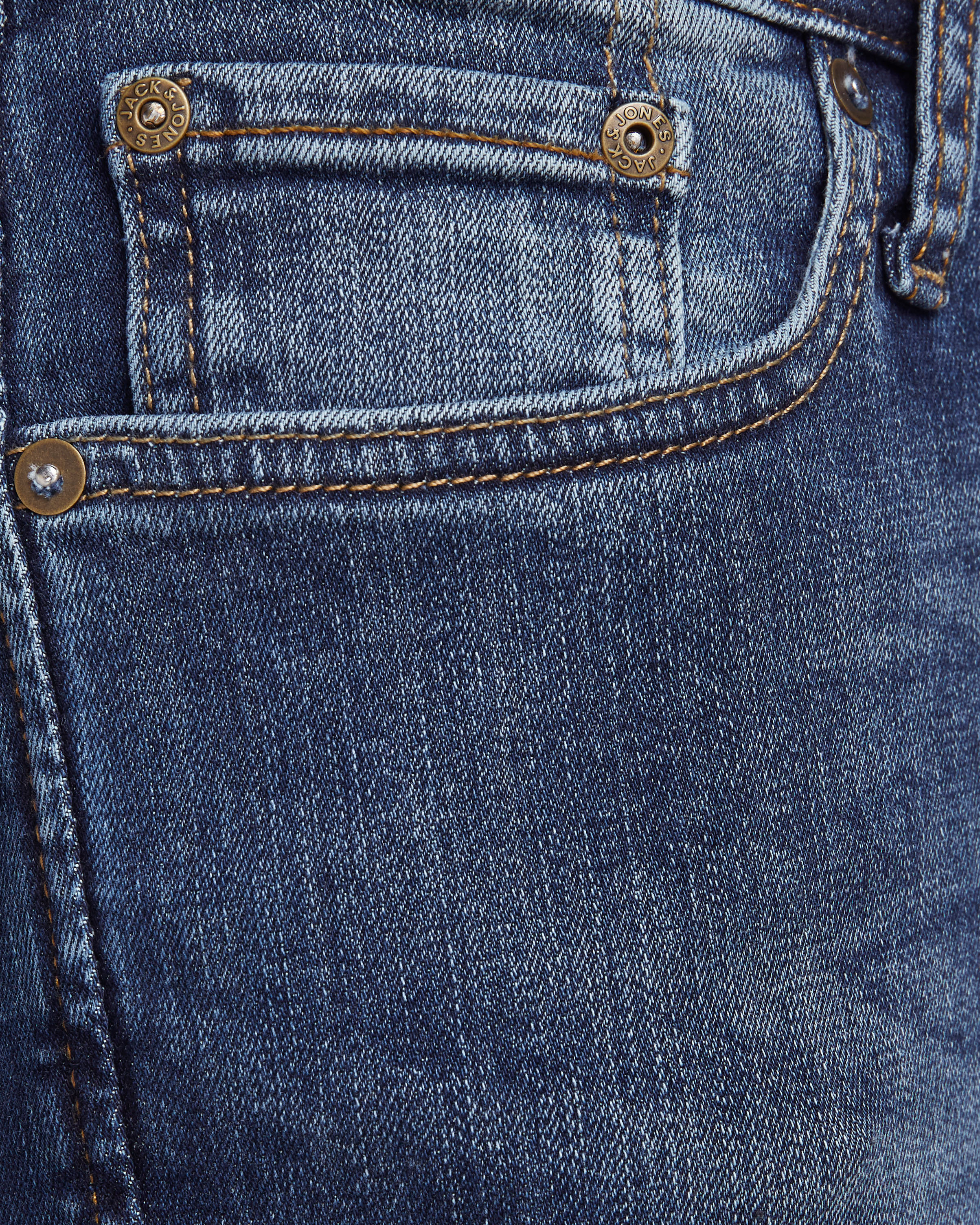 Jeans Liam skinny fit a vita bassa lavaggio scuro stone washed con baffature