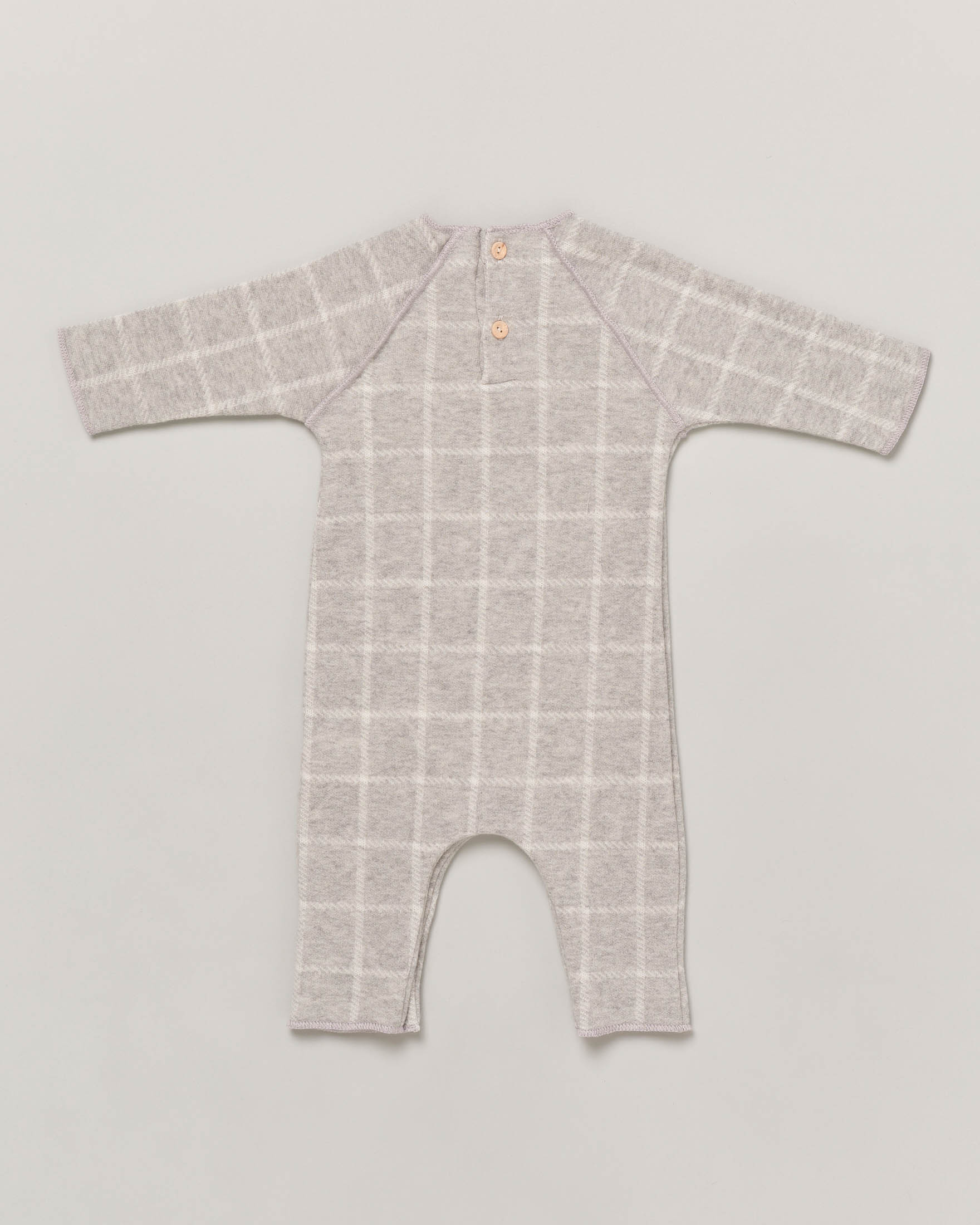 Tutina grigia in fantasia finestrata con manica raglan 3-9 mesi