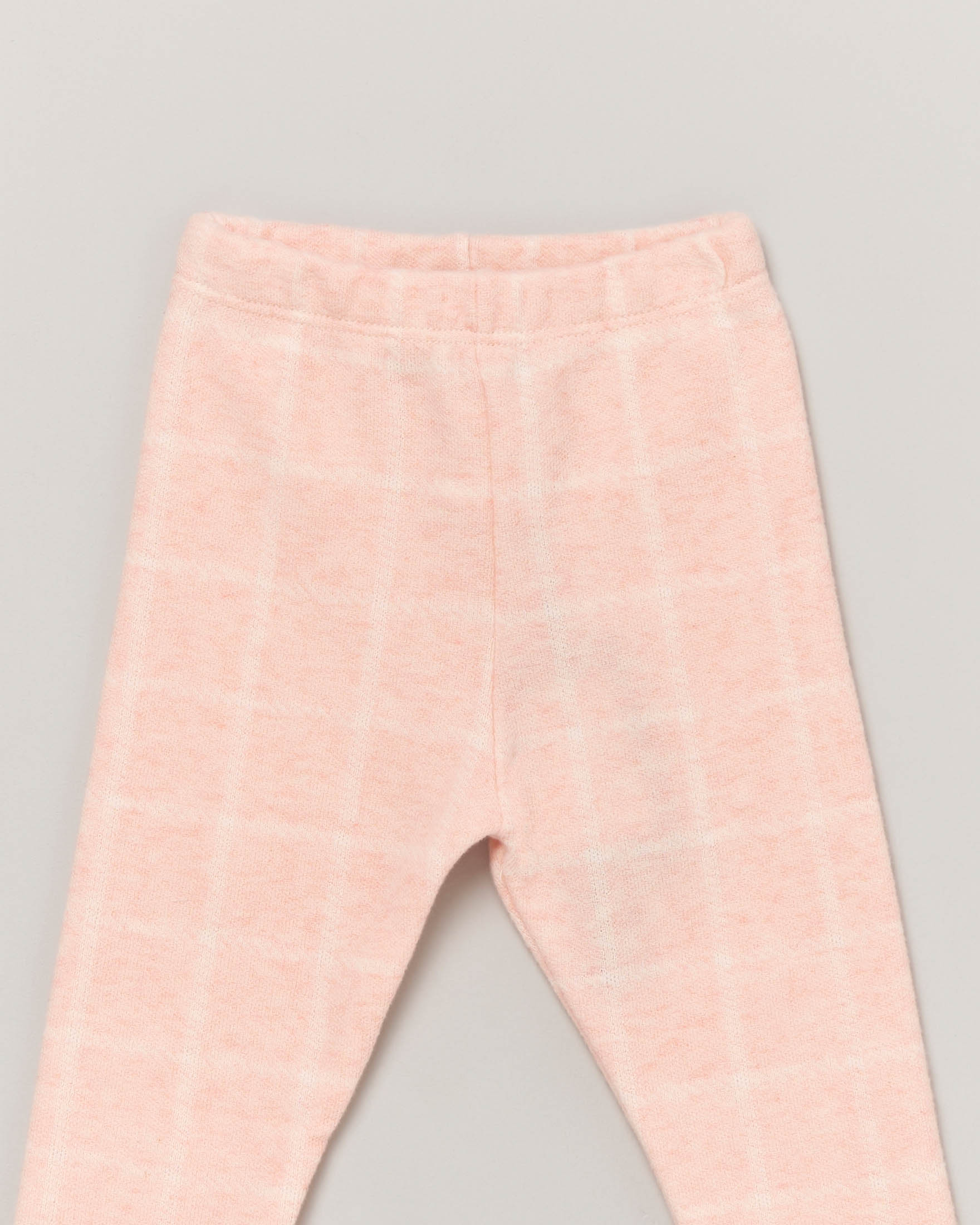 Pantalone in fantasia finestrata color pesca 6-18 mesi
