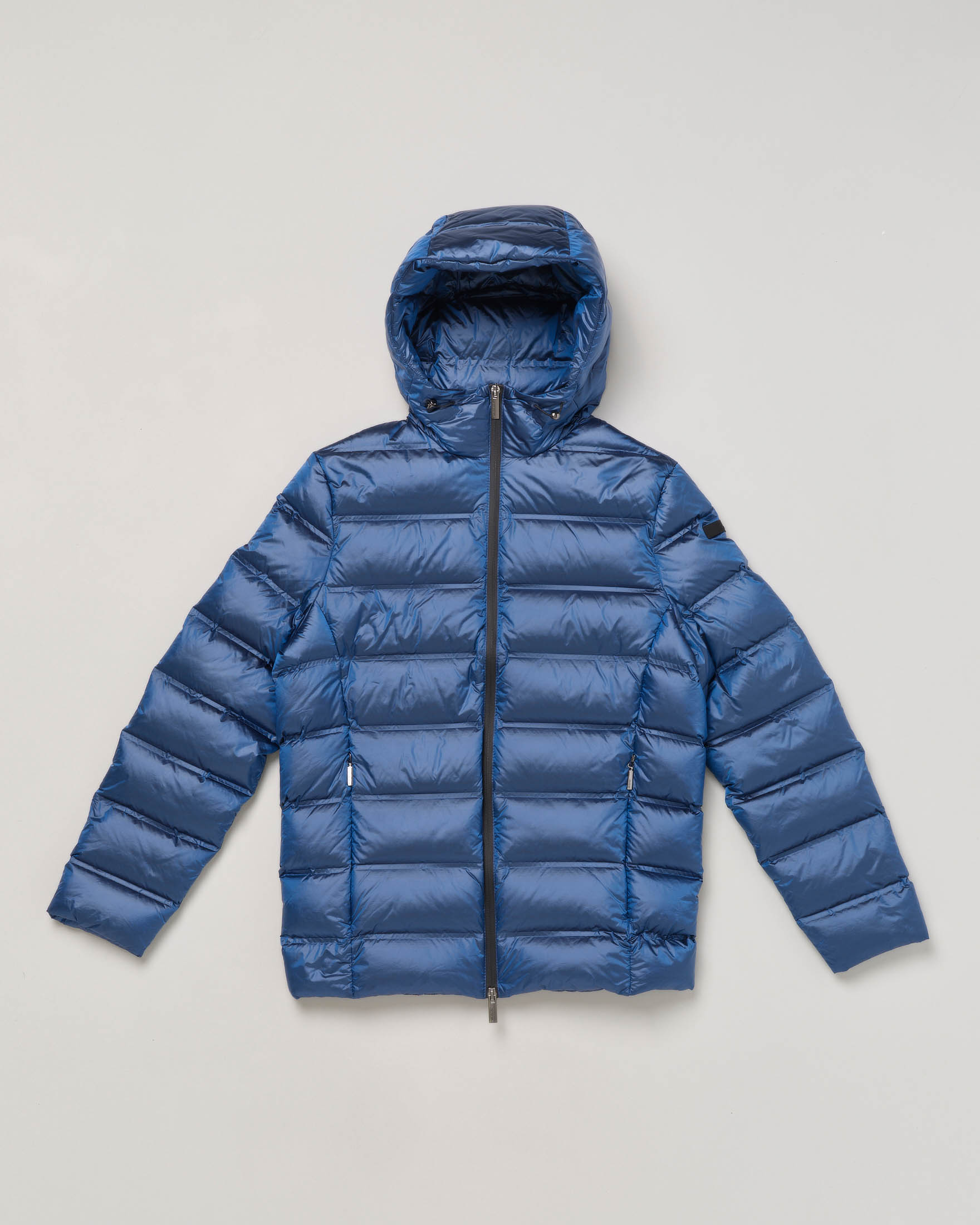 Piumino blu indaco con cappuccio e chiusura zip termonastrata 