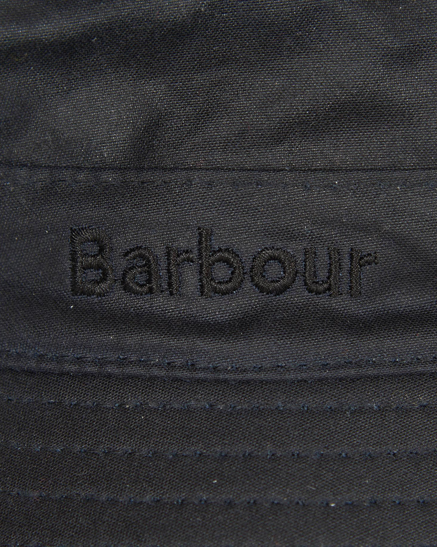 Berretto Barbour blu a pescatore in cotone cerato