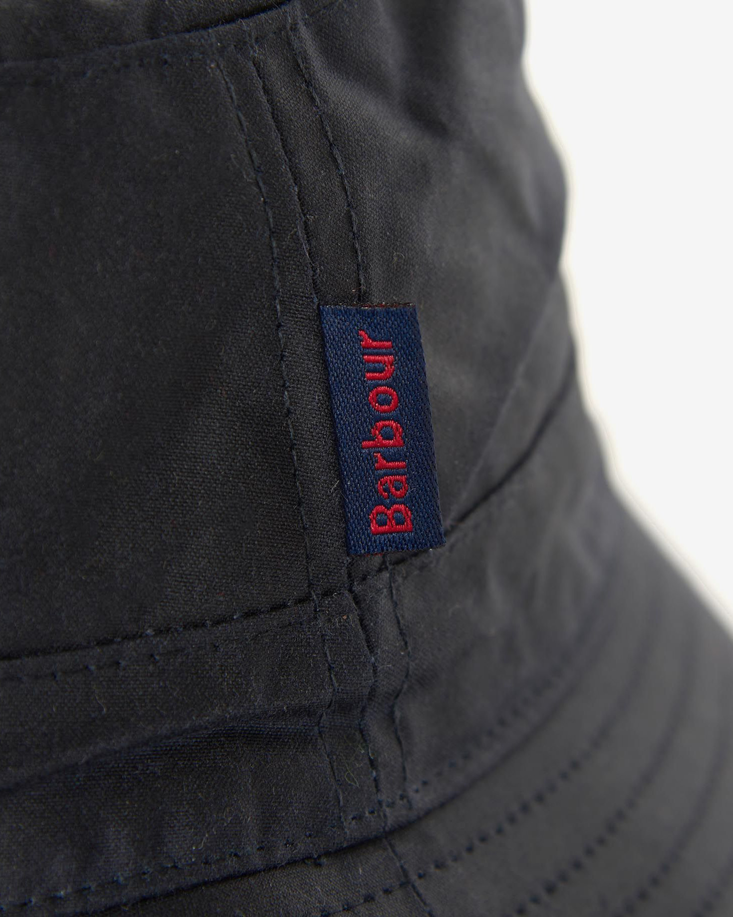 Berretto Barbour blu a pescatore in cotone cerato