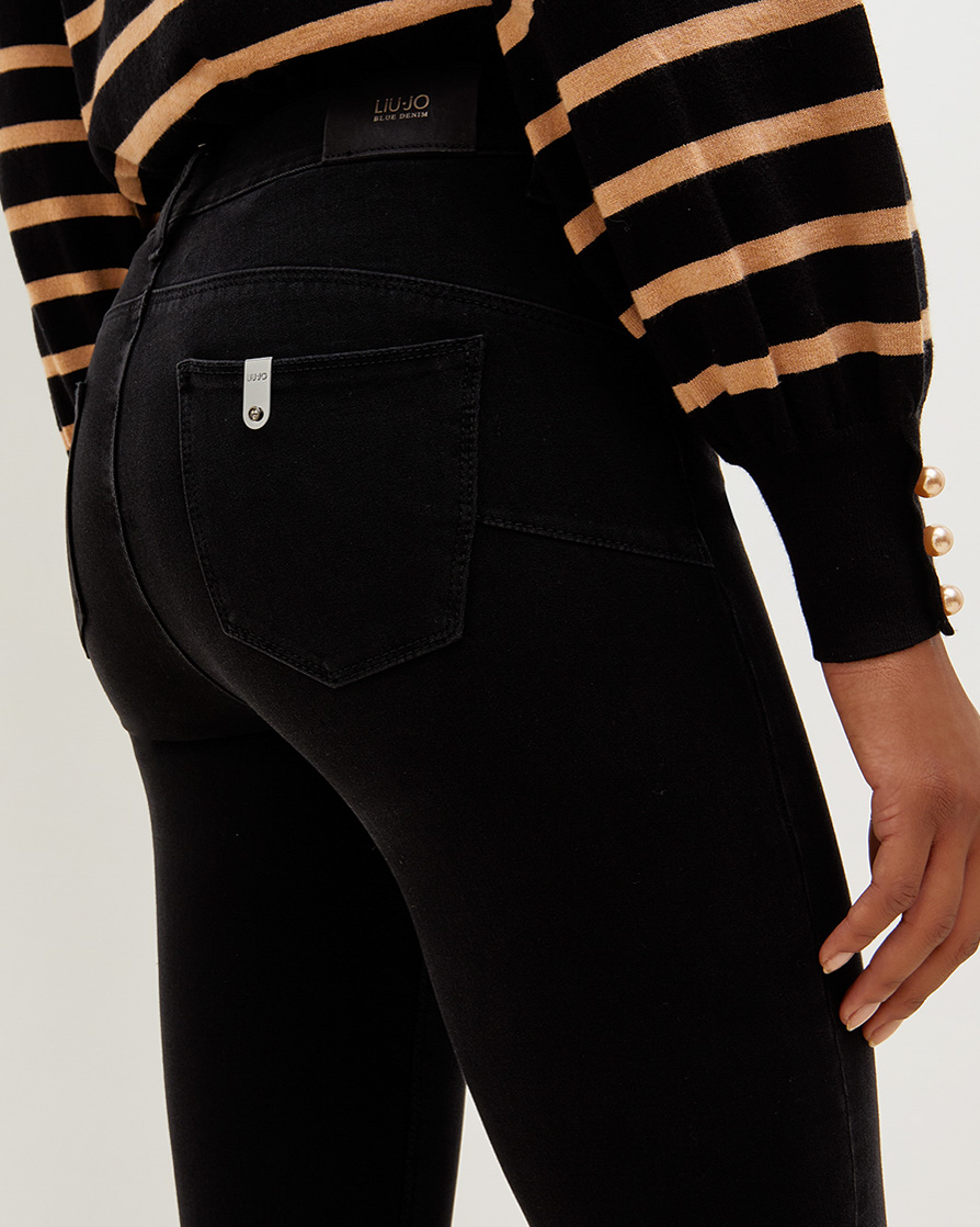 Jeans bottom up neri skinny a vita media in cotone stretch