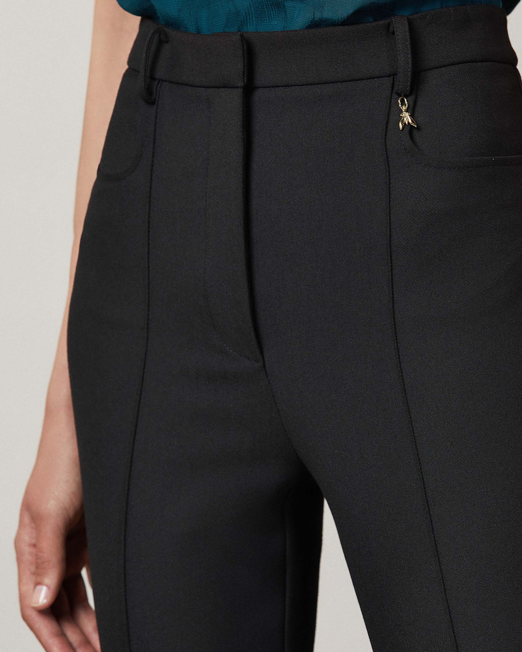 Pantaloni skinny neri extra lunghi in tessuto tecnico diagonale