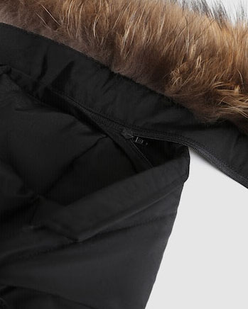 Arctic Parka Woolrich nero con pelliccia racoon staccabile
