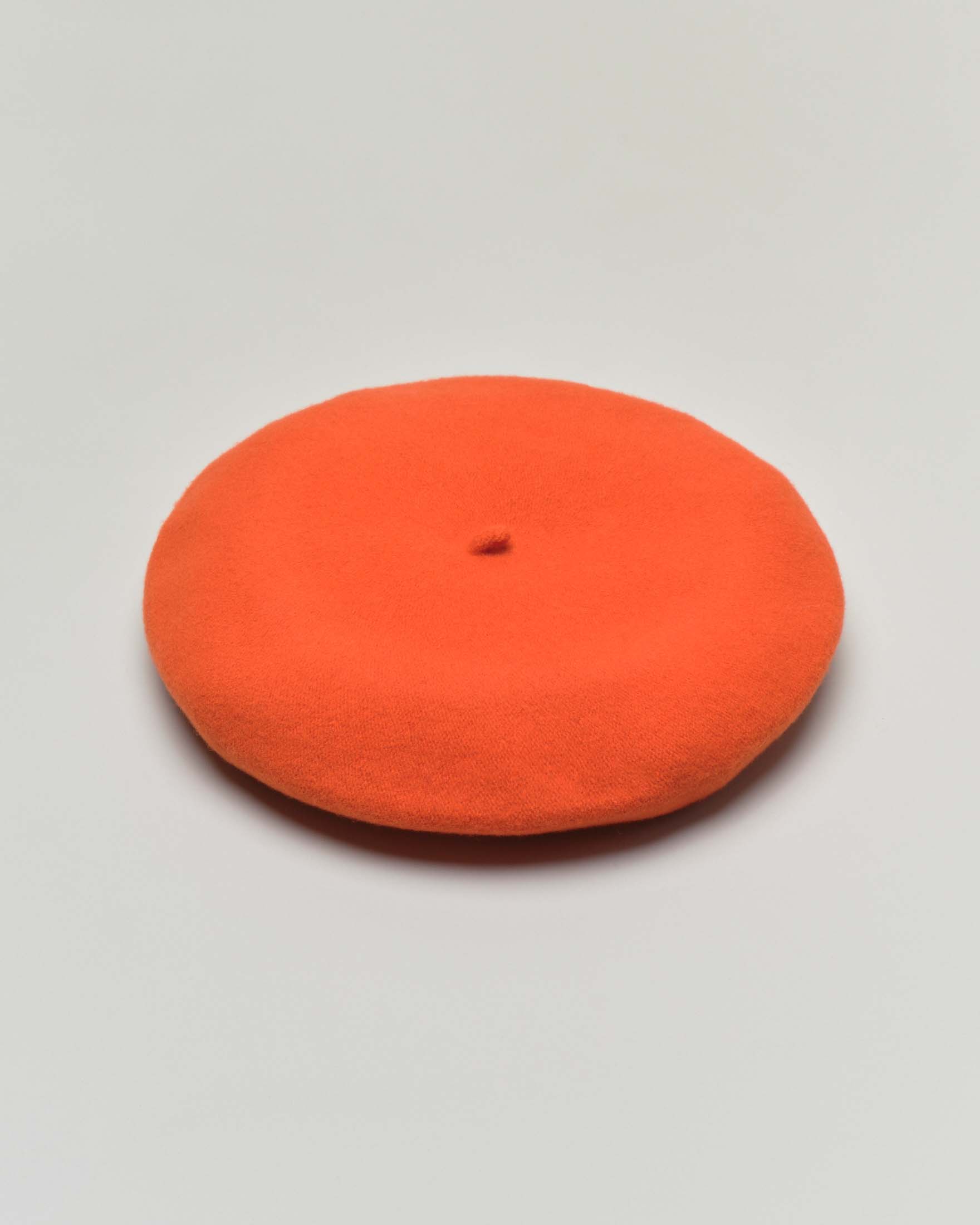 Basco in feltro di pura lana color arancio