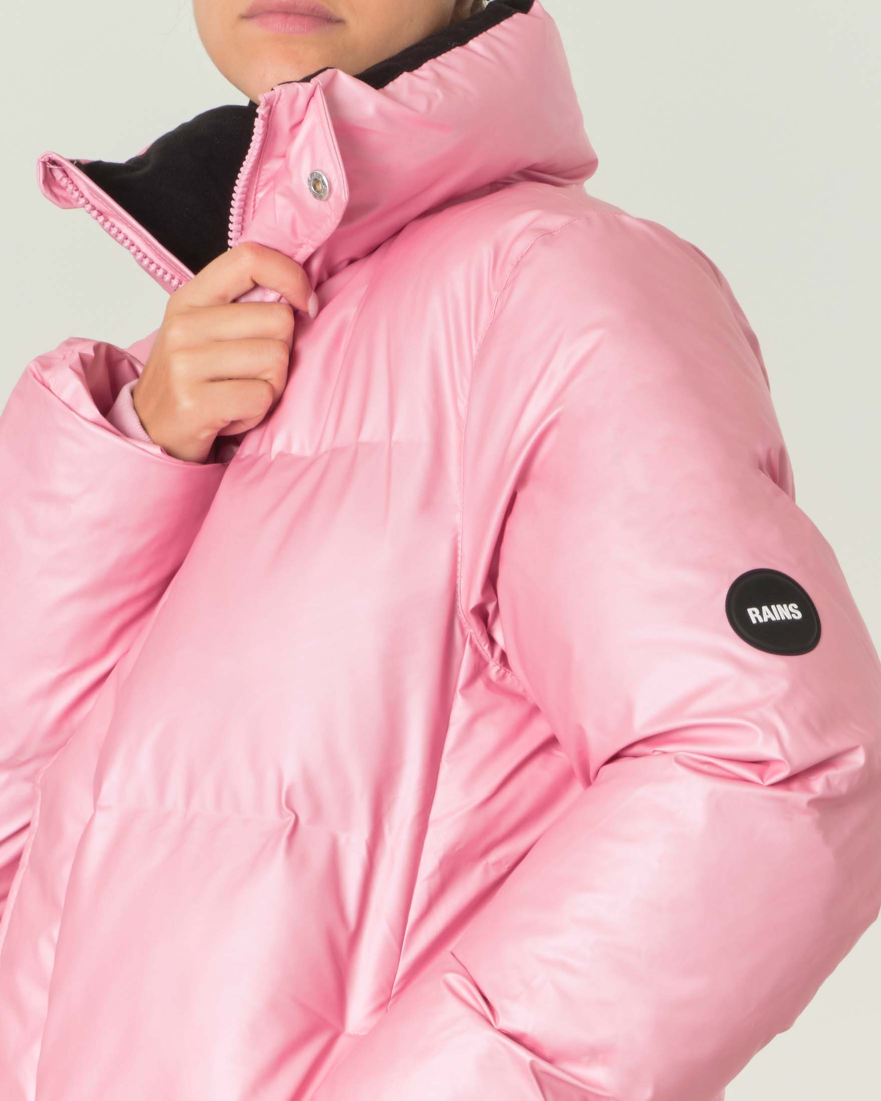 Boxy Puffer Jacket rosa realizzato in un PU traspirante impermeabile con colletto alto