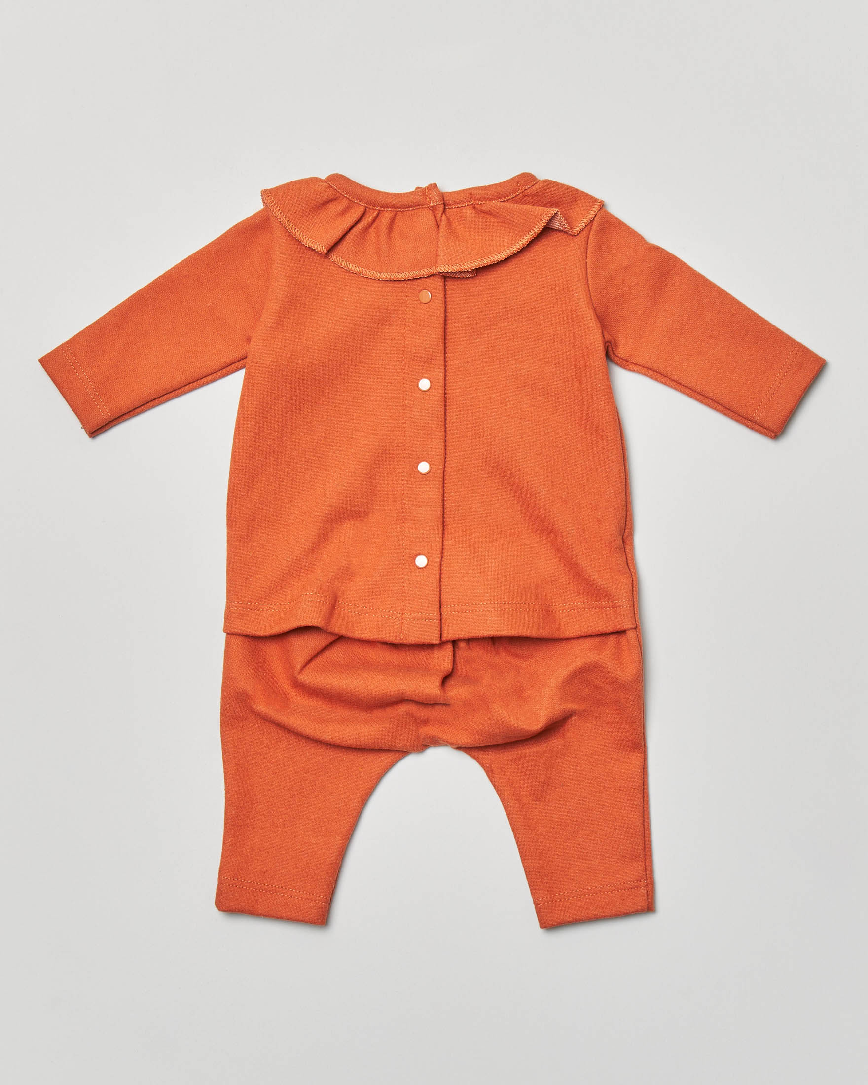 Tutina arancione tinta unita con volants 3-9 mesi