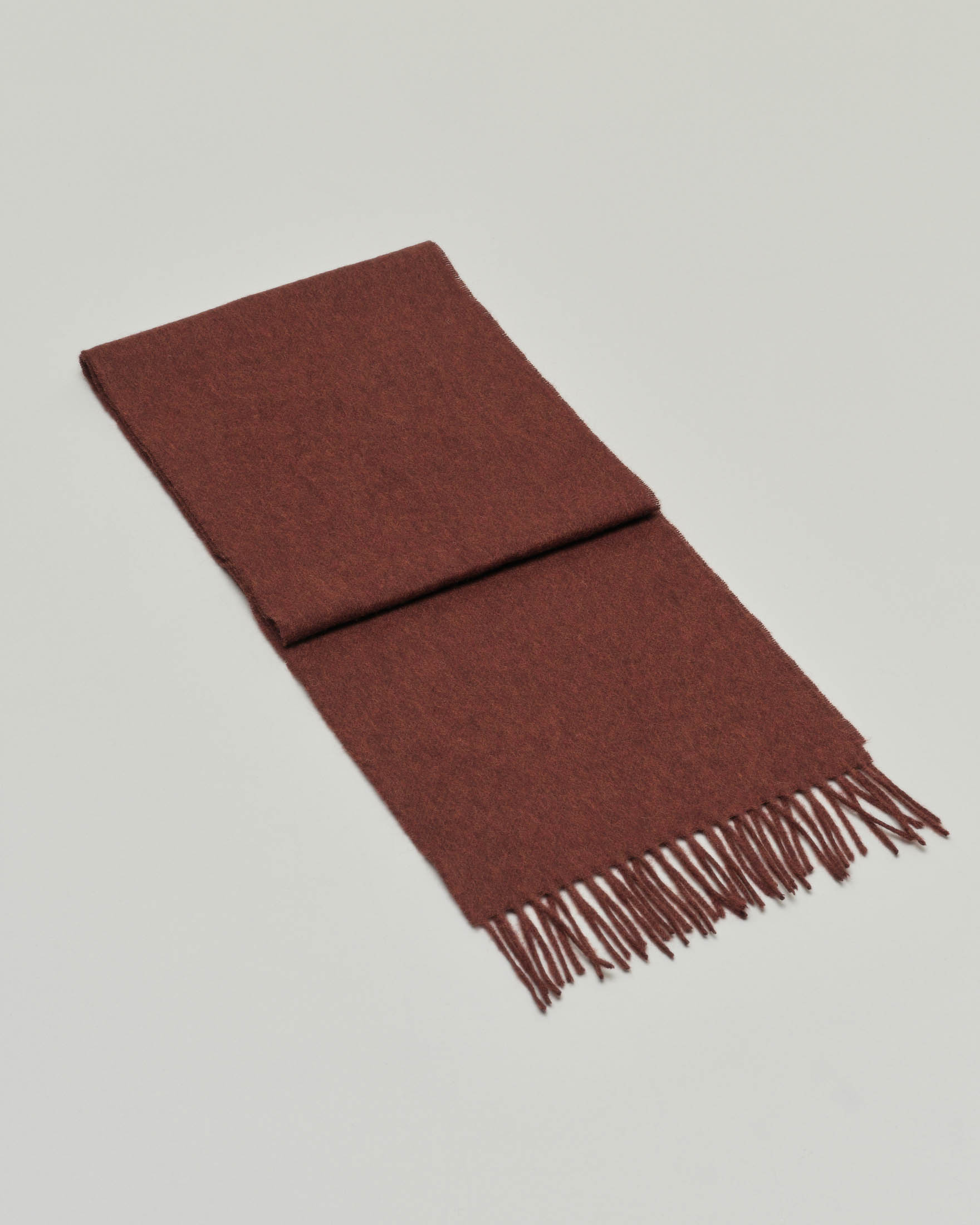 Sciarpa Bronte by Moon bordeaux in pura lana merinos rifinita con frange