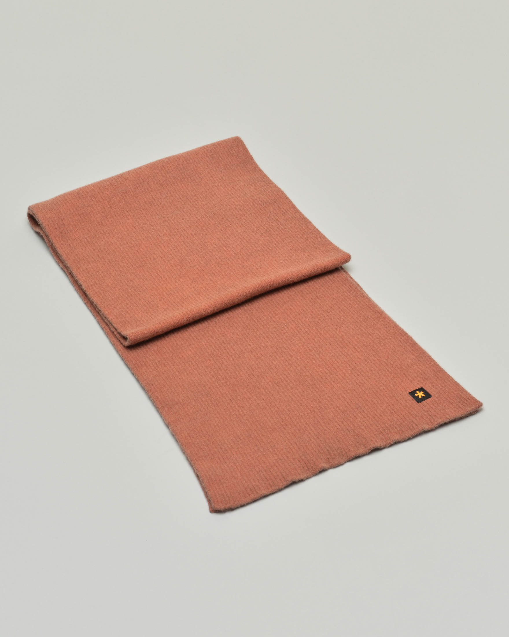 Sciarpa color coccio in lana a costine