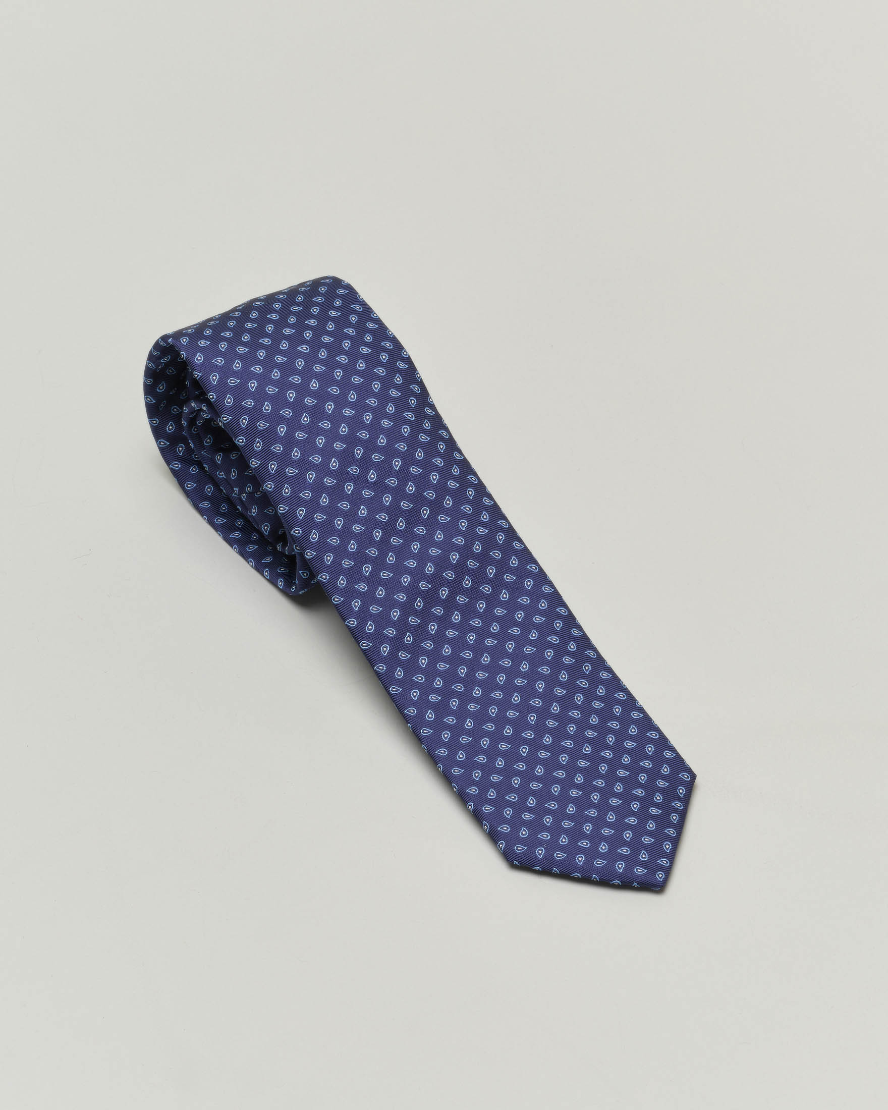 Cravatta blu con micro fantasia cachemire azzurra in pura seta