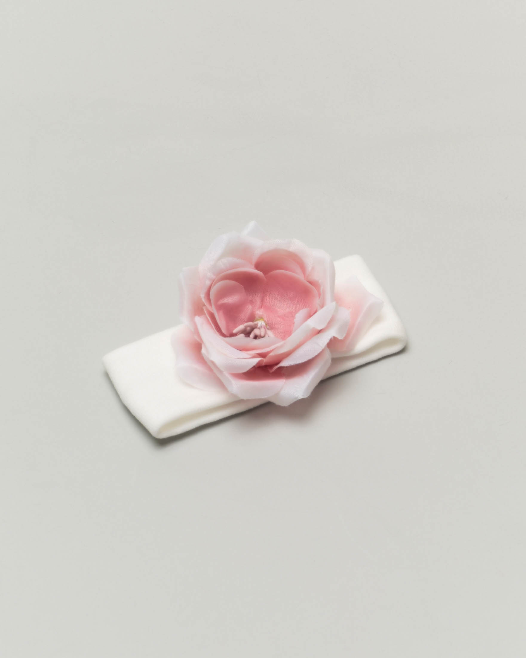 Fascia Bufi bianca con rosa applicata 