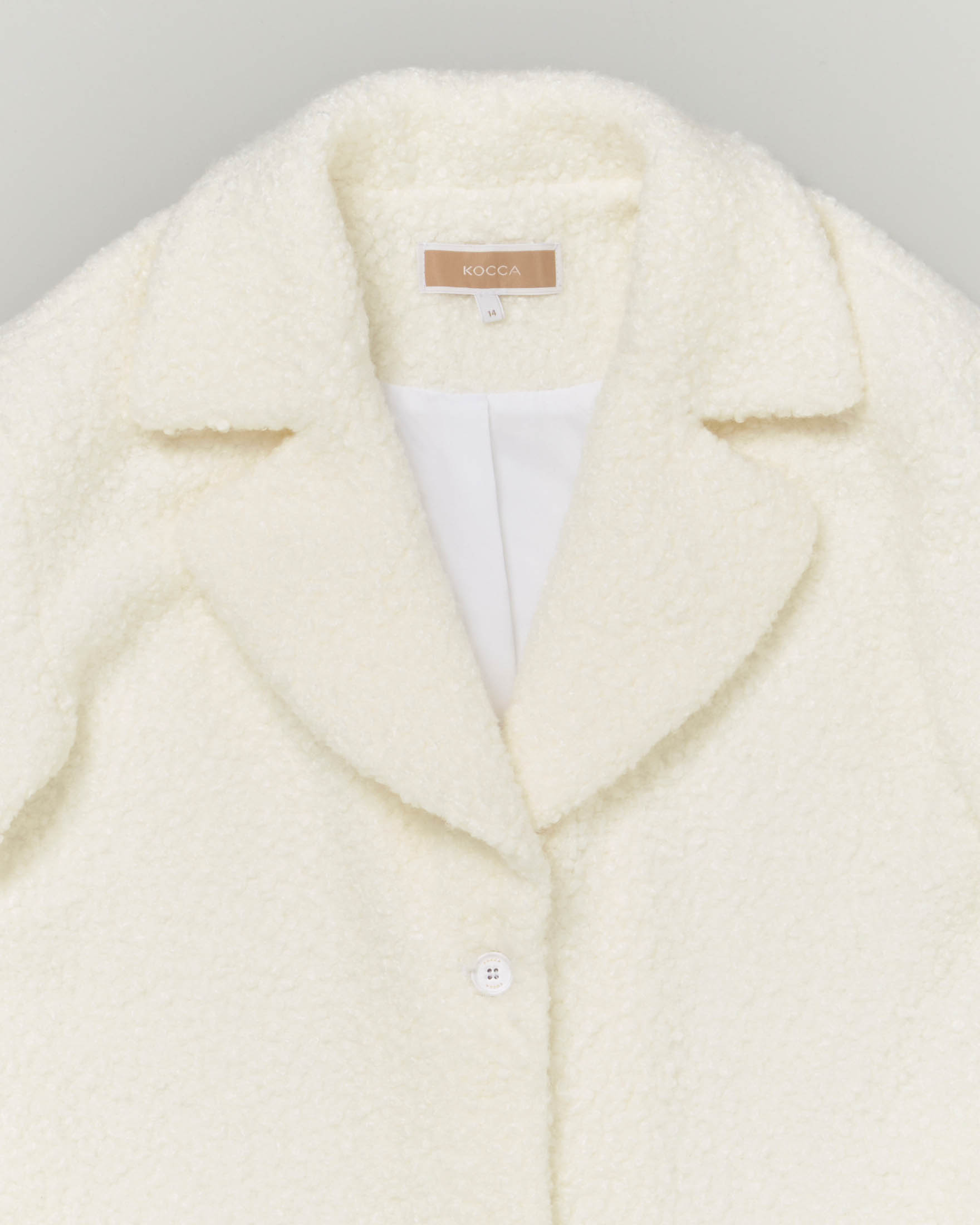 Cappotto Teddy bianco con chiusura a due bottoni 10-16 anni