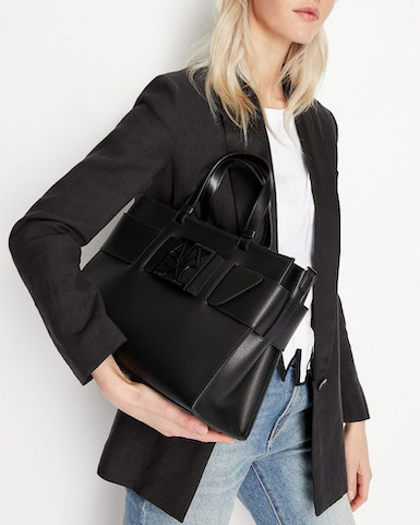 Borsa a mano in similpelle nera con maxi fibbia a specchio tono su tono con scritta logo image