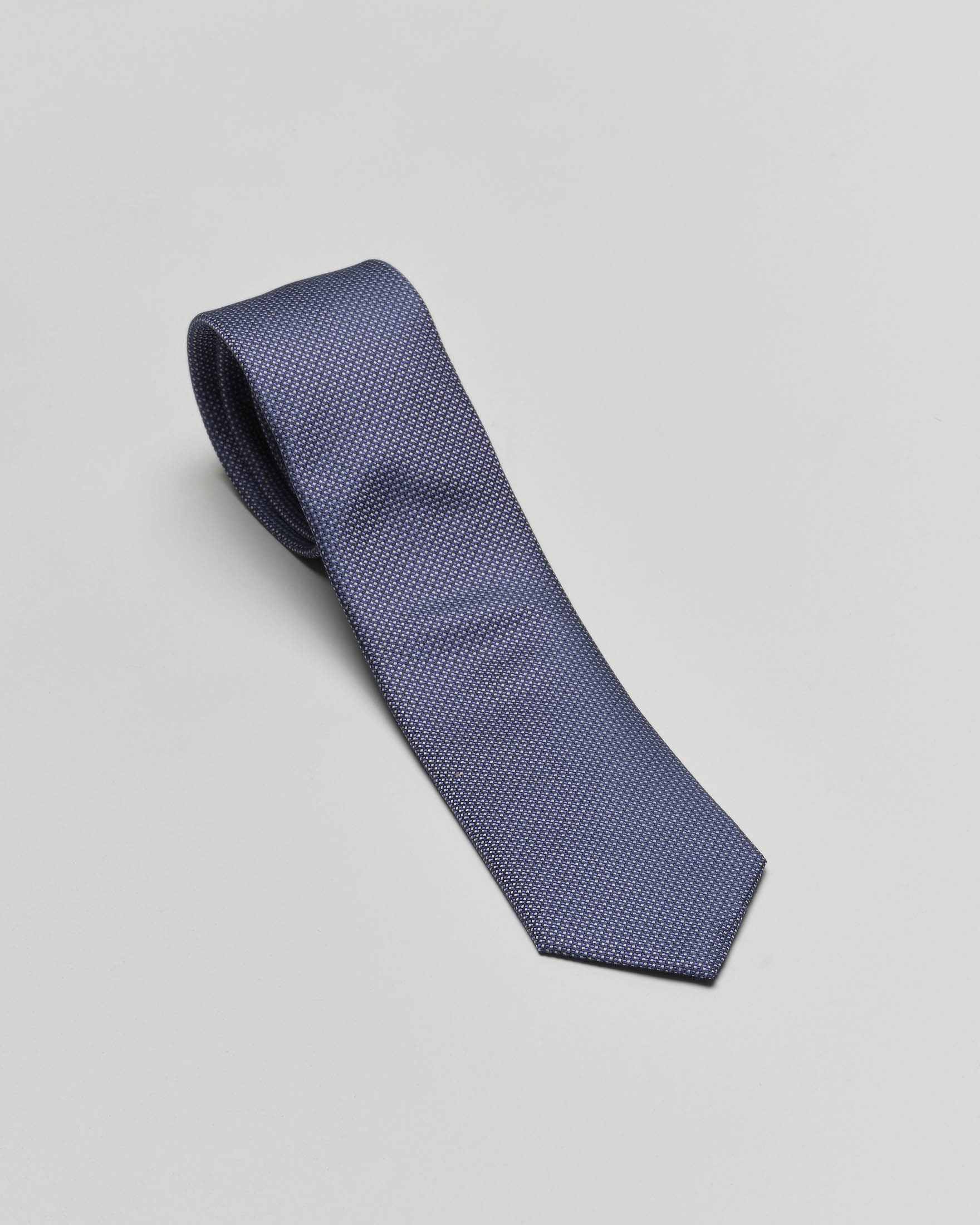 Cravatta blu micro fantasia armaturata in seta