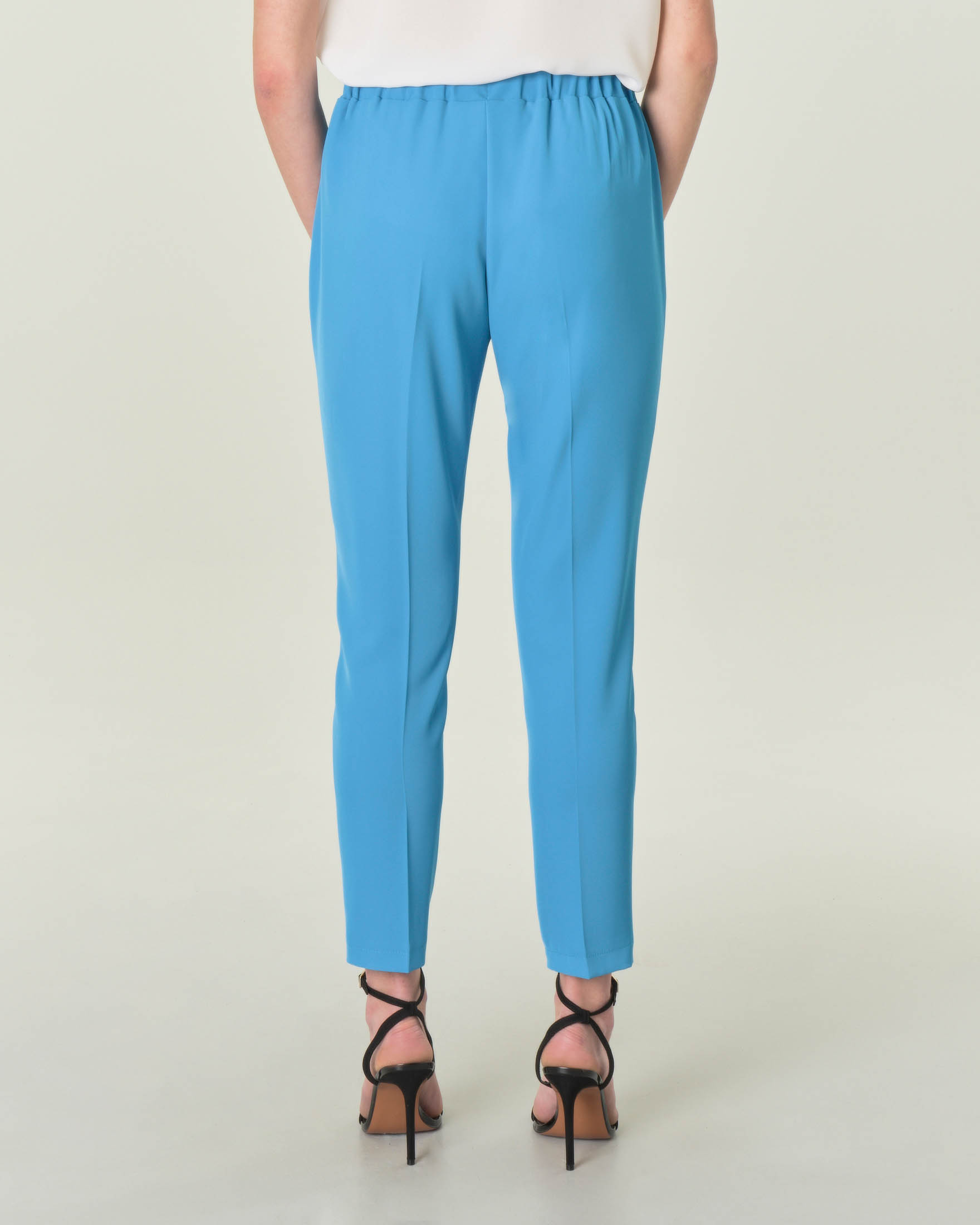 Pantaloni turchesi in tessuto tecnico stretch con elastico