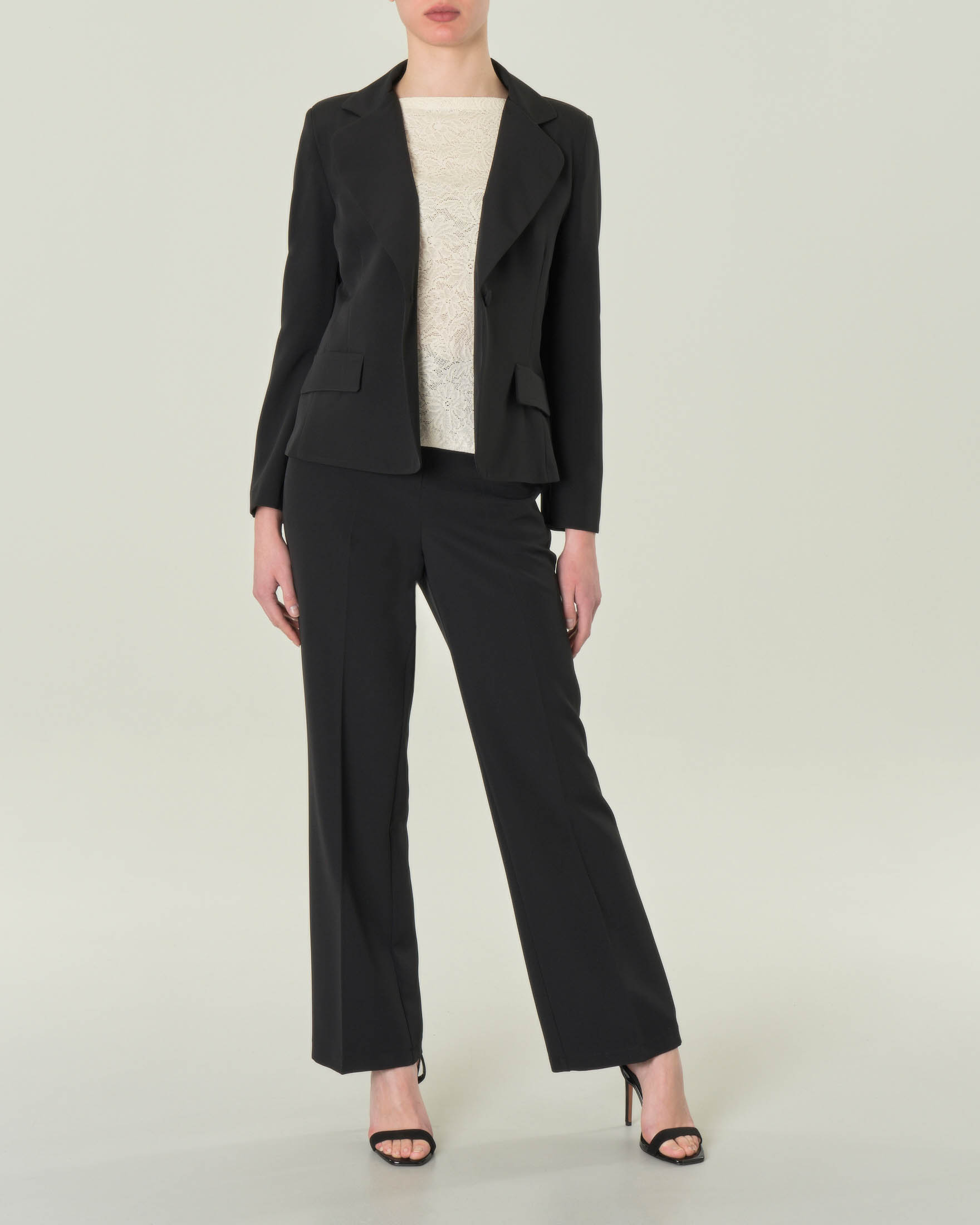 Pantaloni neri in tessuto tecnico stretch con piega stirata image