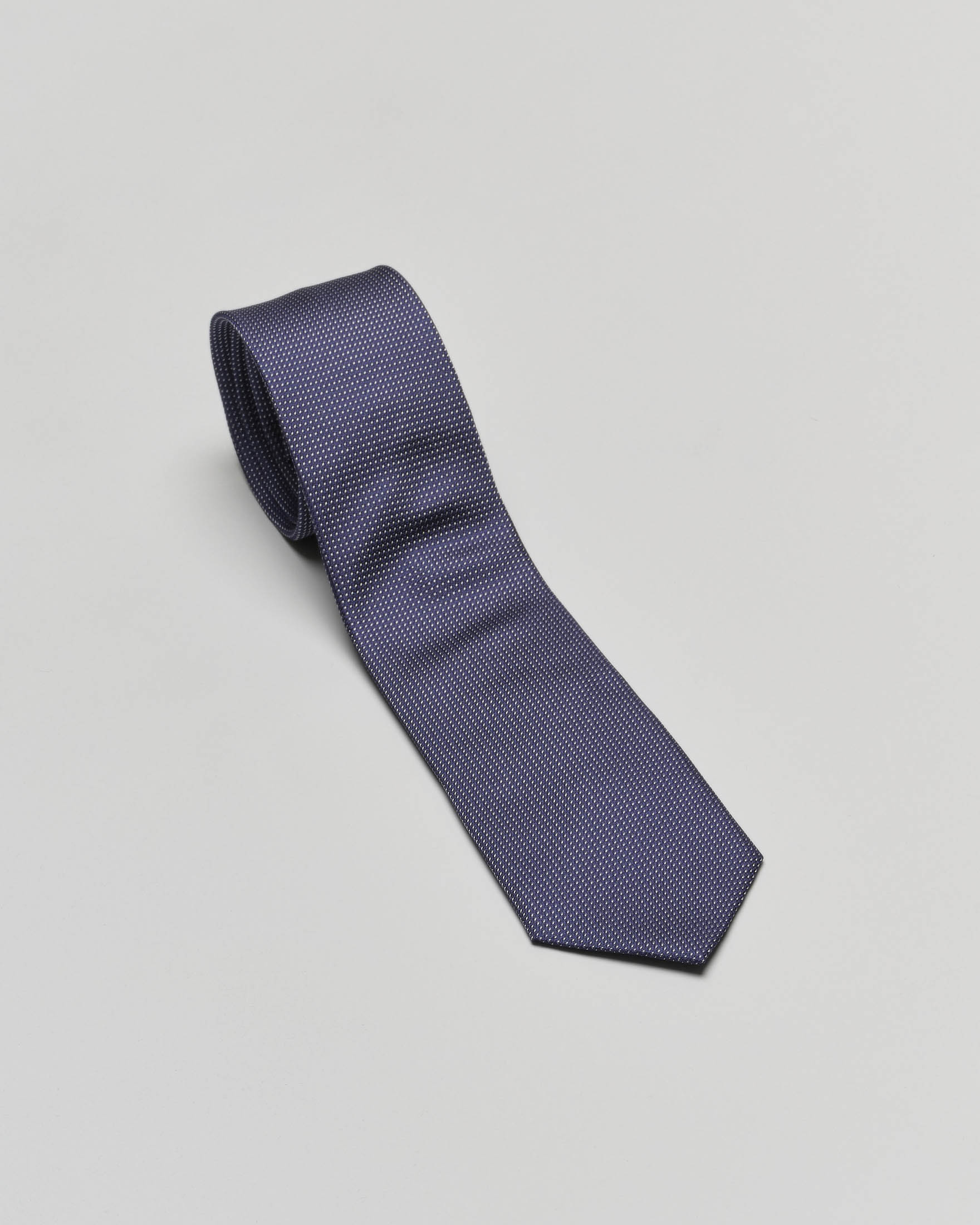 Cravatta blu con micro puntino bianco in pura seta