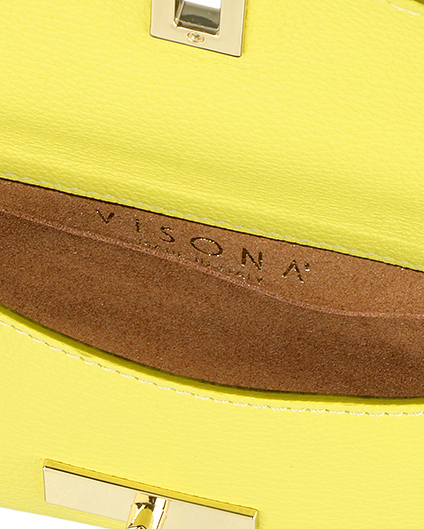 Pochette gialla in pelle con chiusura a girello e tracolla removibile image