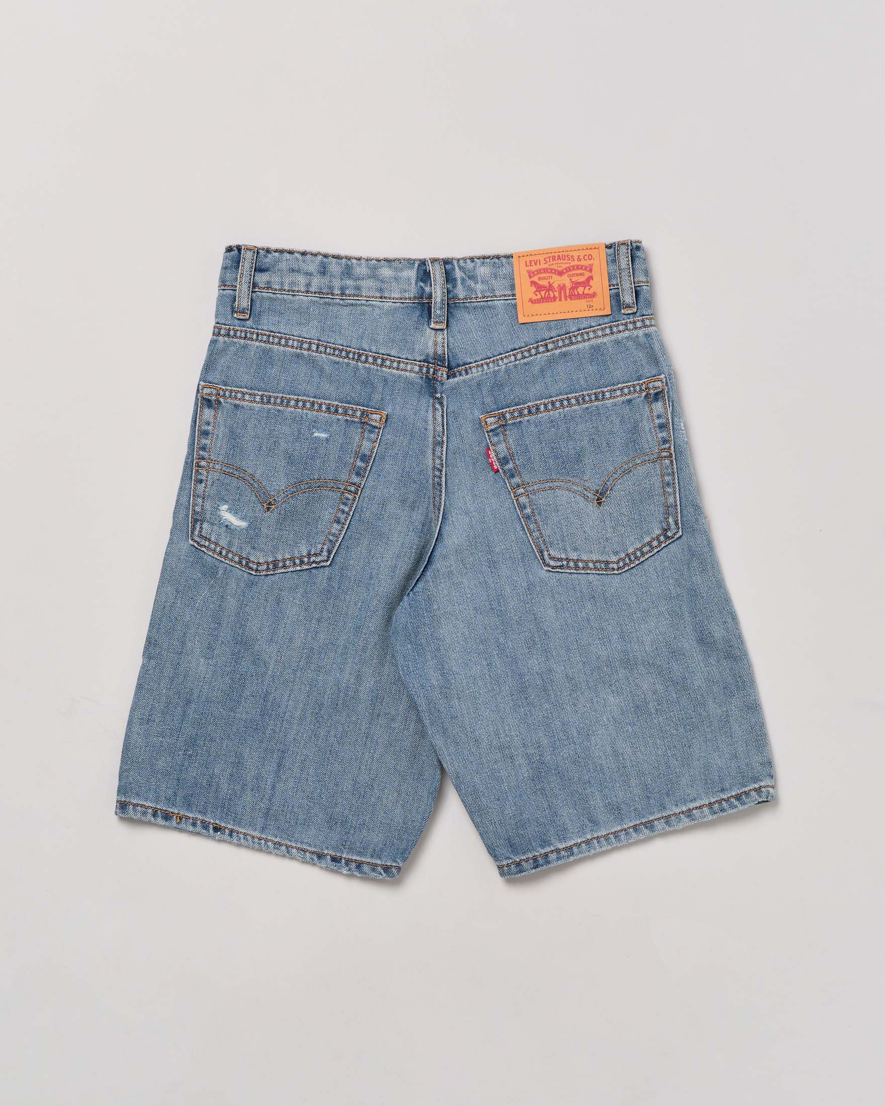 Bermuda in denim blu lavaggio chiaro con rotture ed abrasioni 10-16 anni
