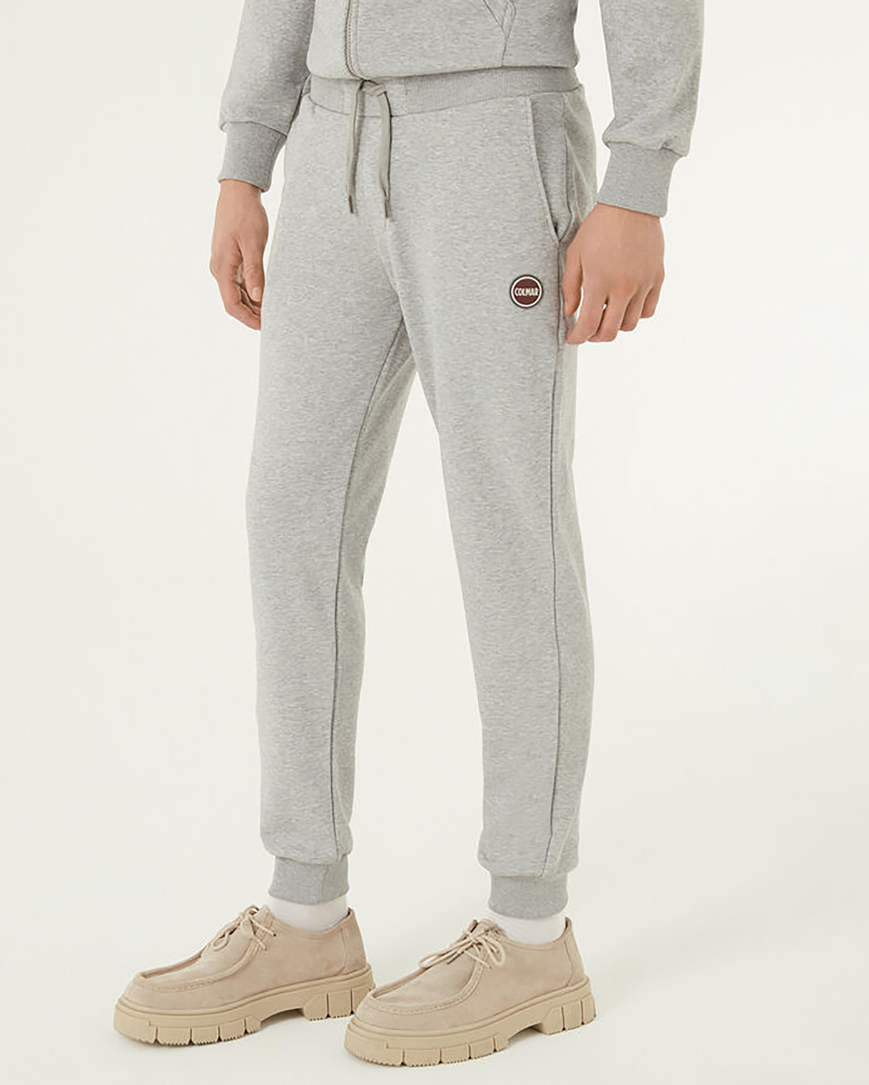 Pantalone grigio in felpa di cotone con logo bollo applicato