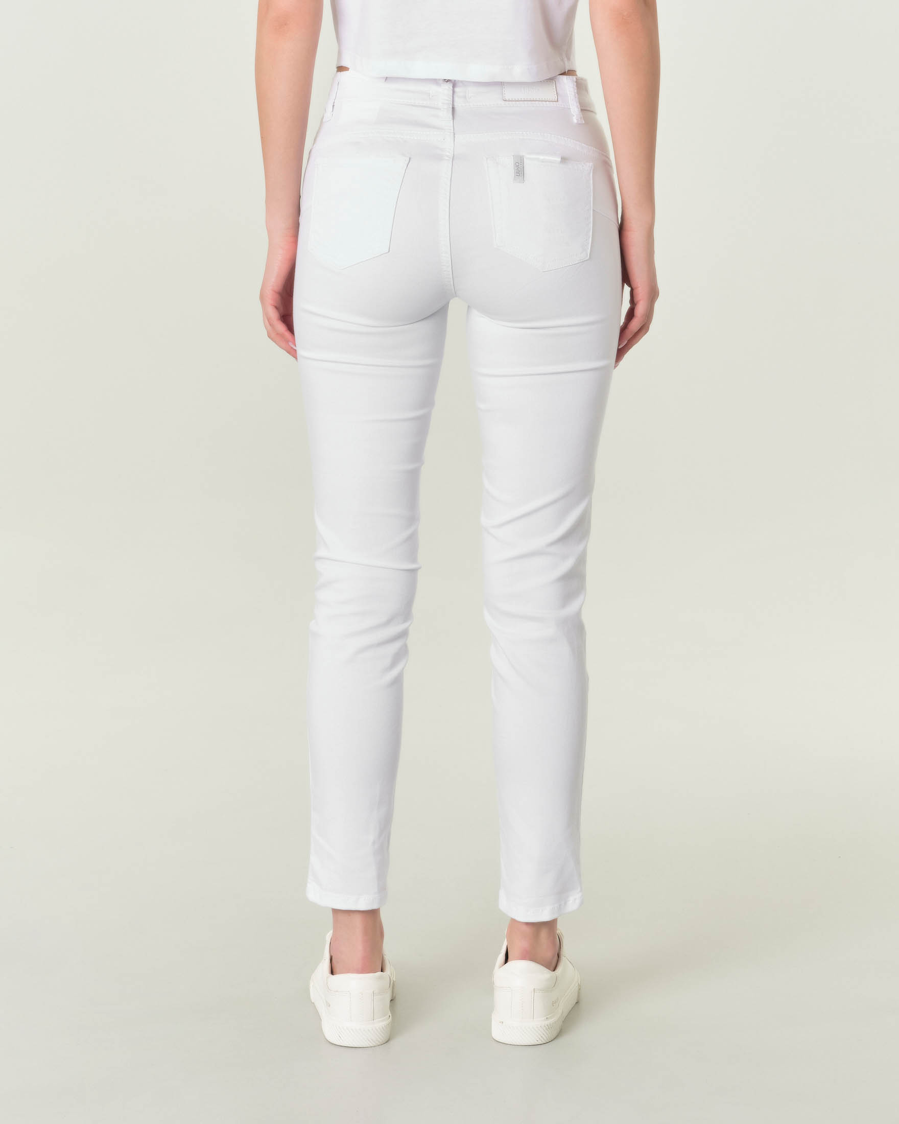 Pantaloni bianchi Bottom Up stretch in cotone stretch dalla linea skinny  con bottoni a vista